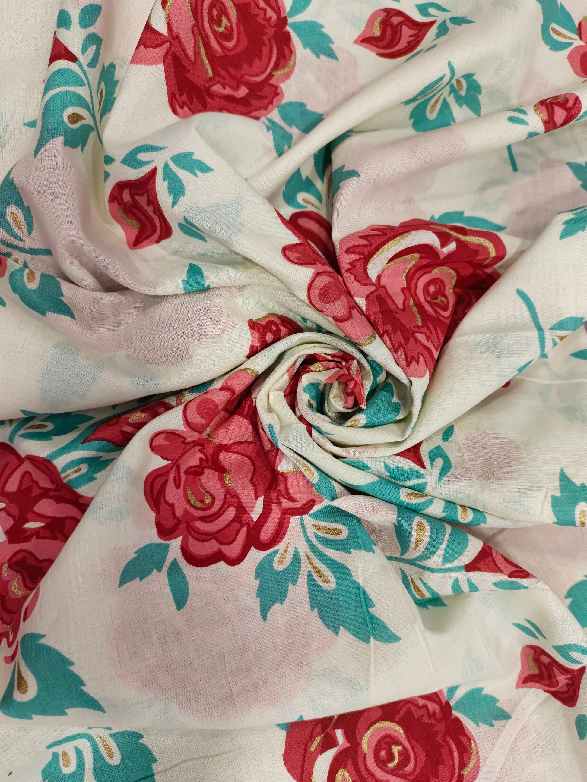 Off white base with red roses with all over