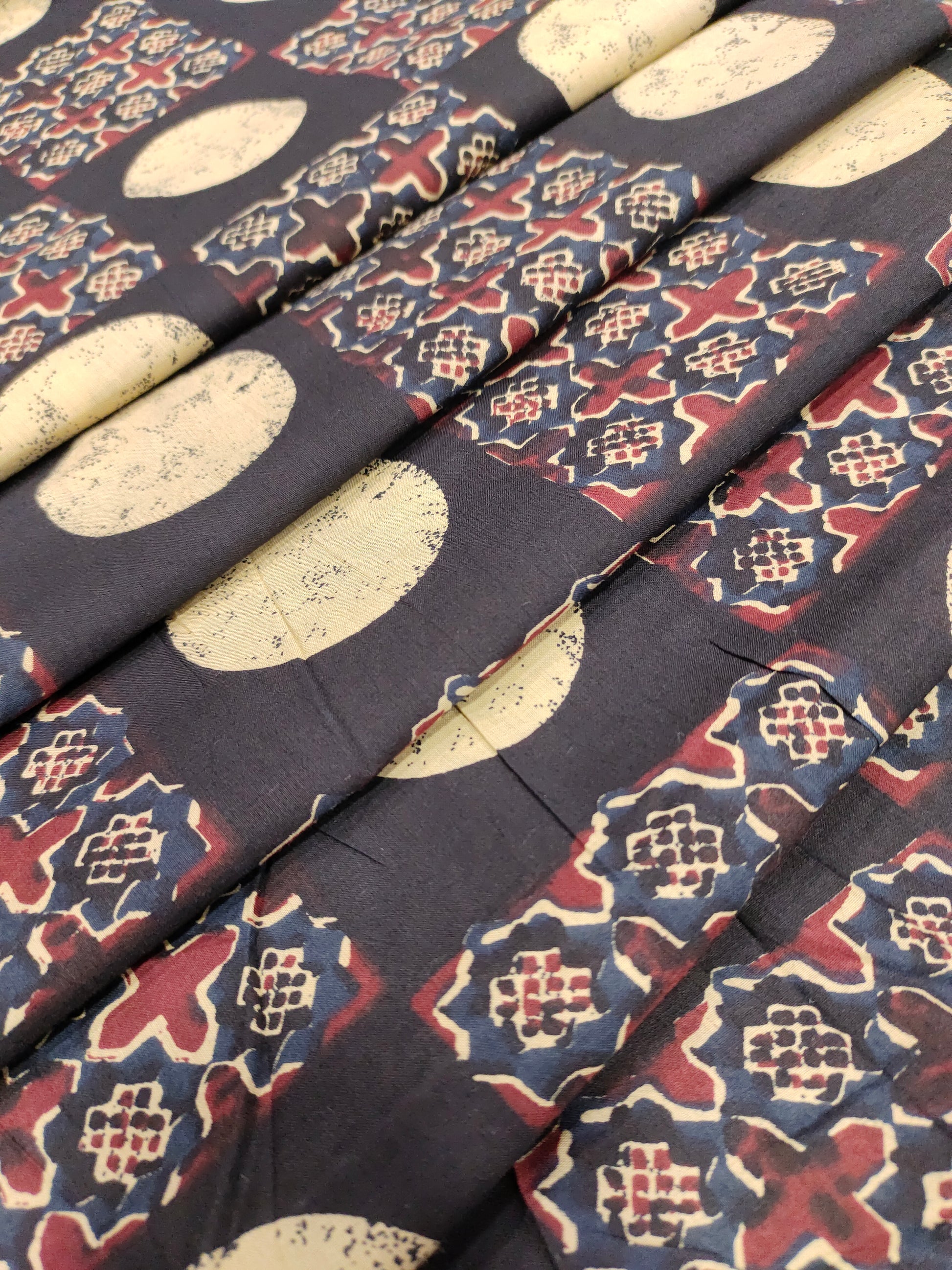 Black cotton print fabric with marron & blue