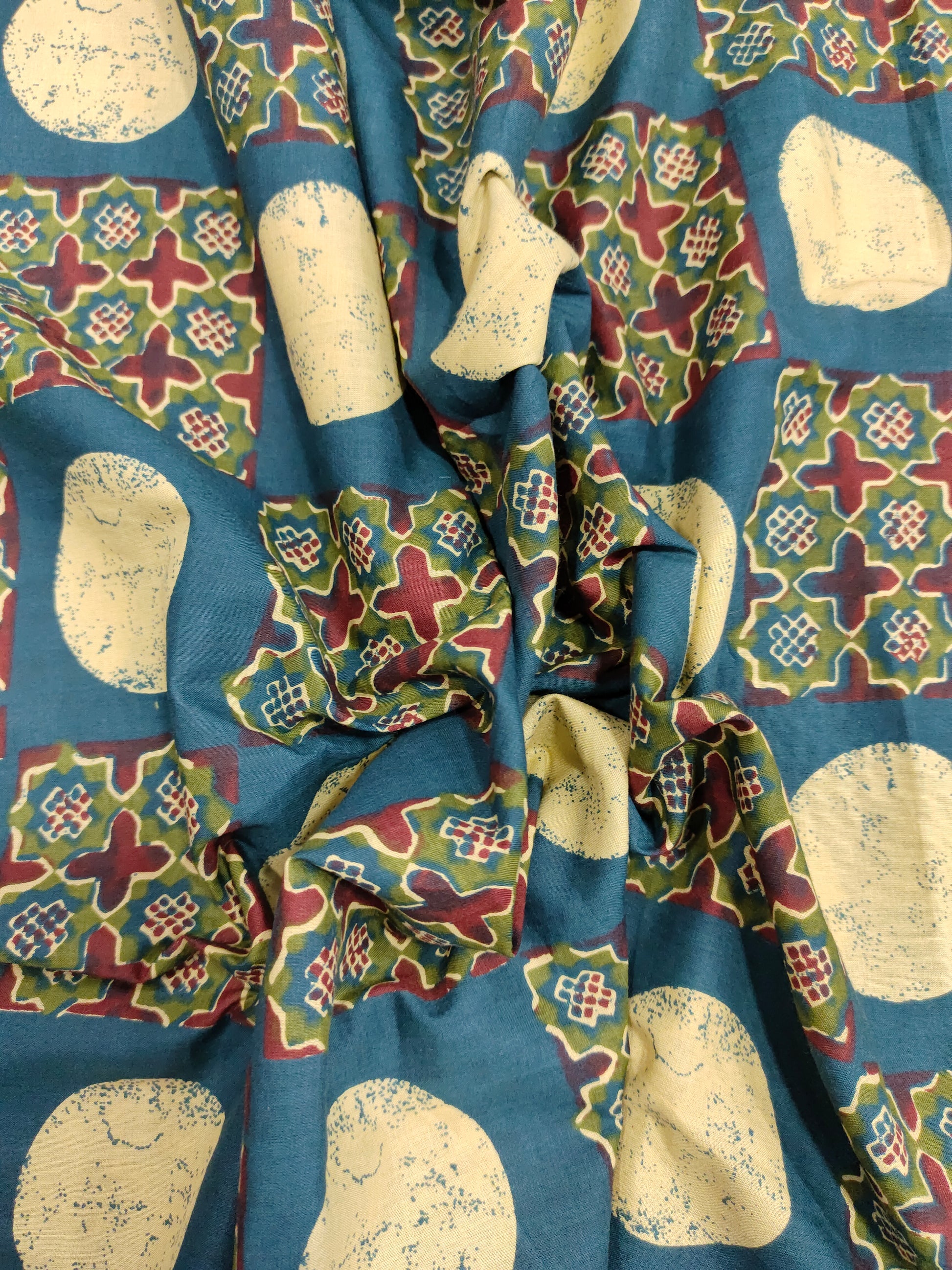 Cotton screen print blue fabric with maroon green and off white
