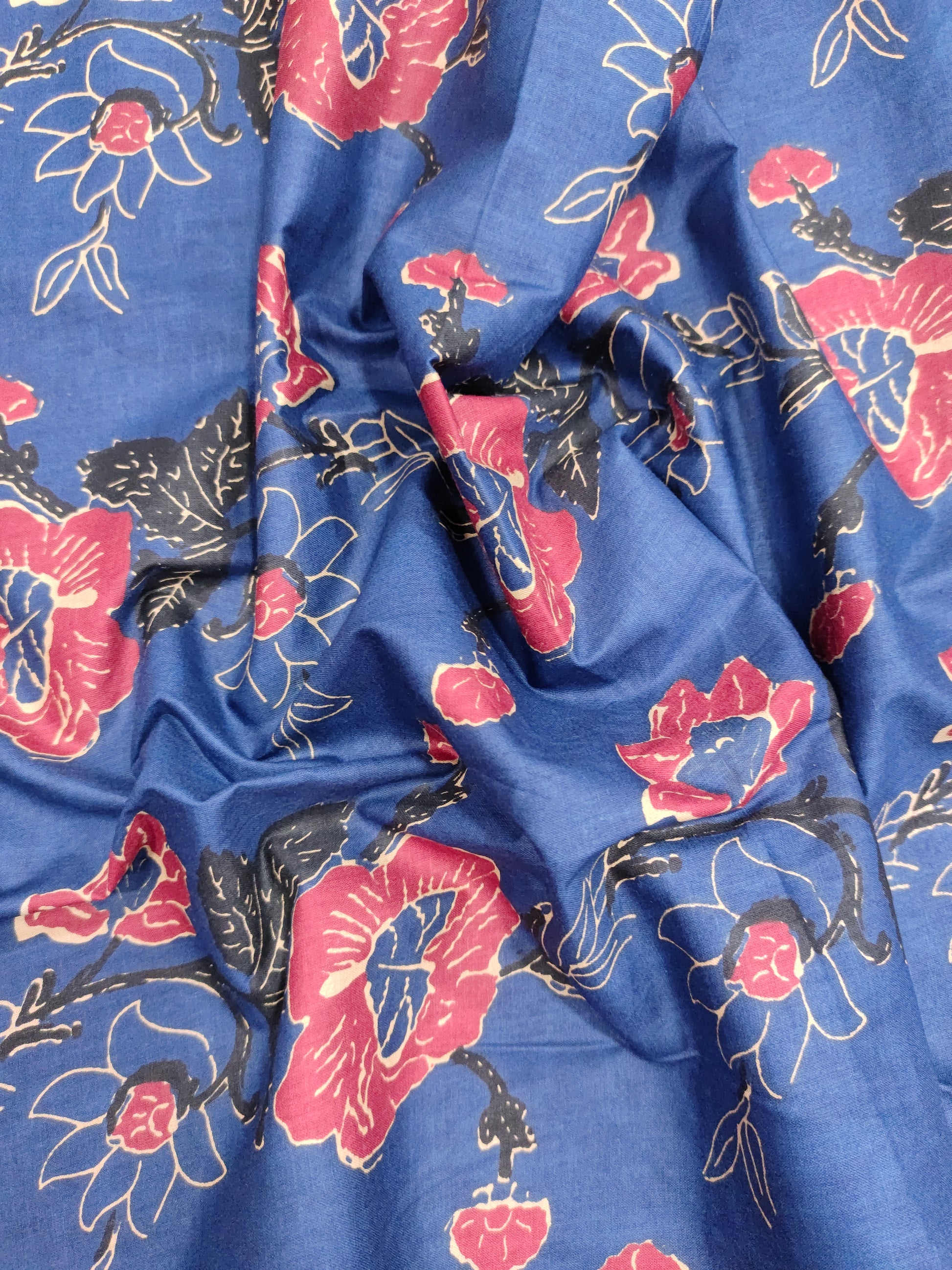 Navy base with rust floral cotton screen print