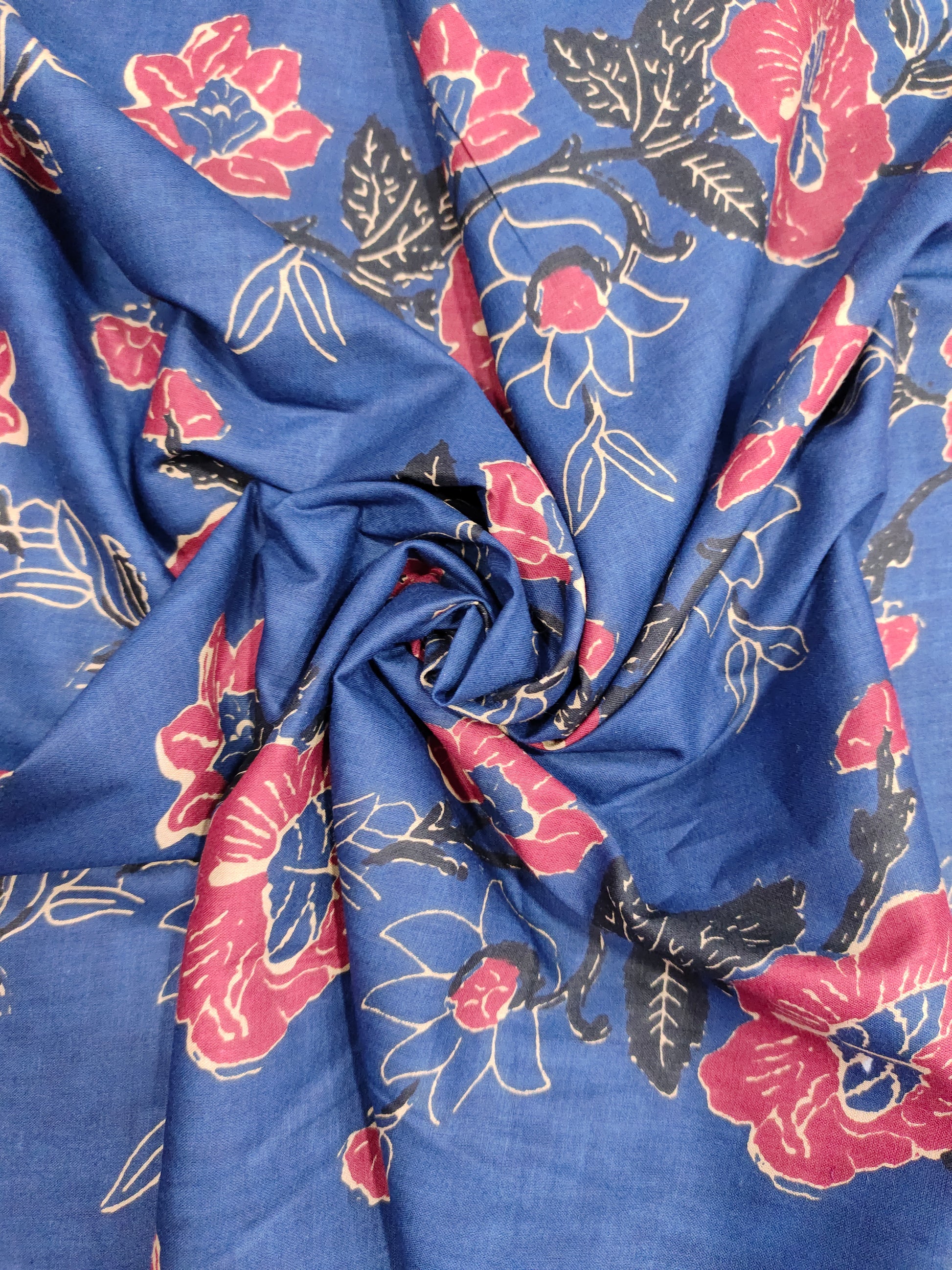 Navy base with rust floral cotton screen print