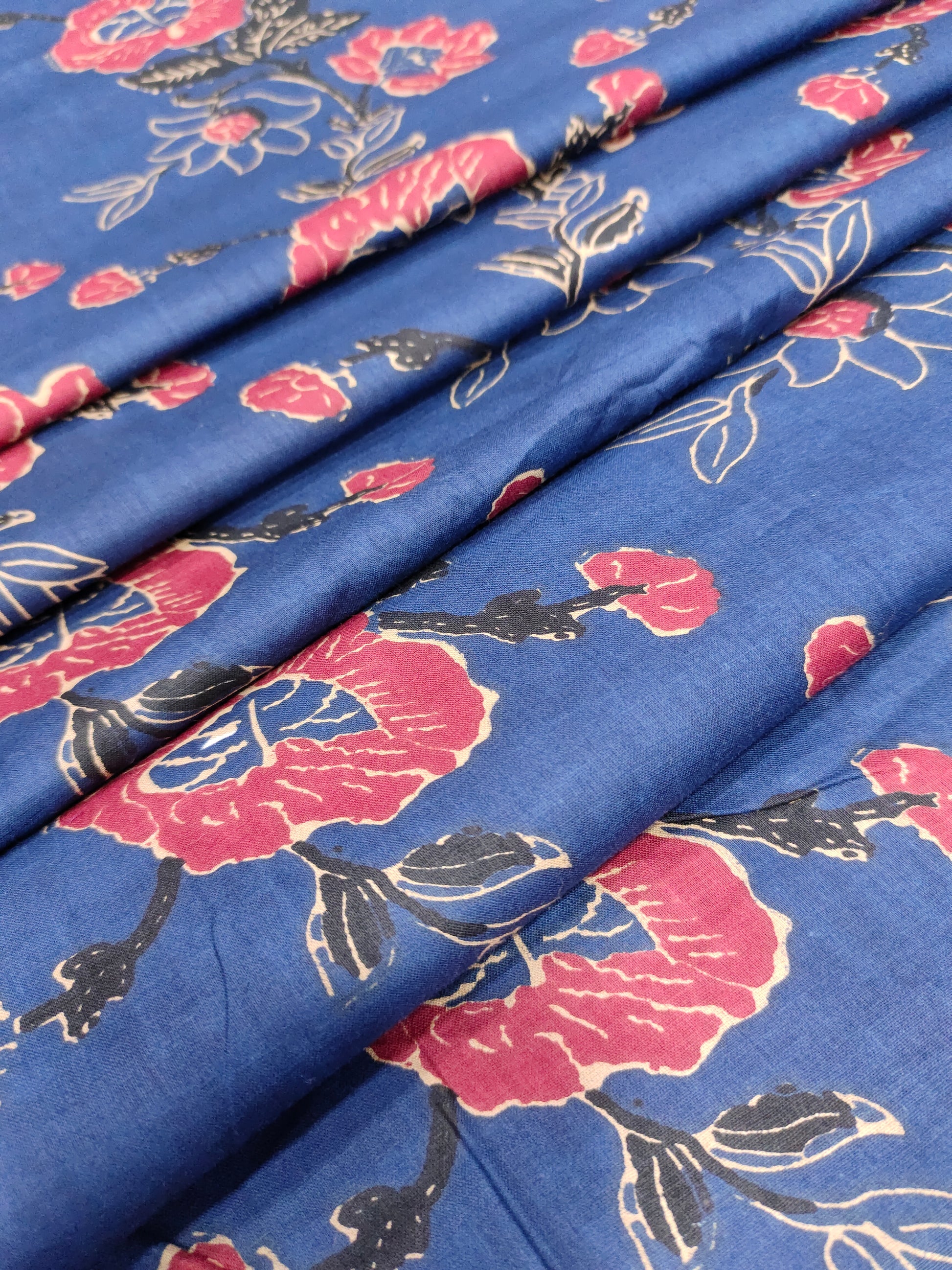 Navy base with rust floral cotton screen print