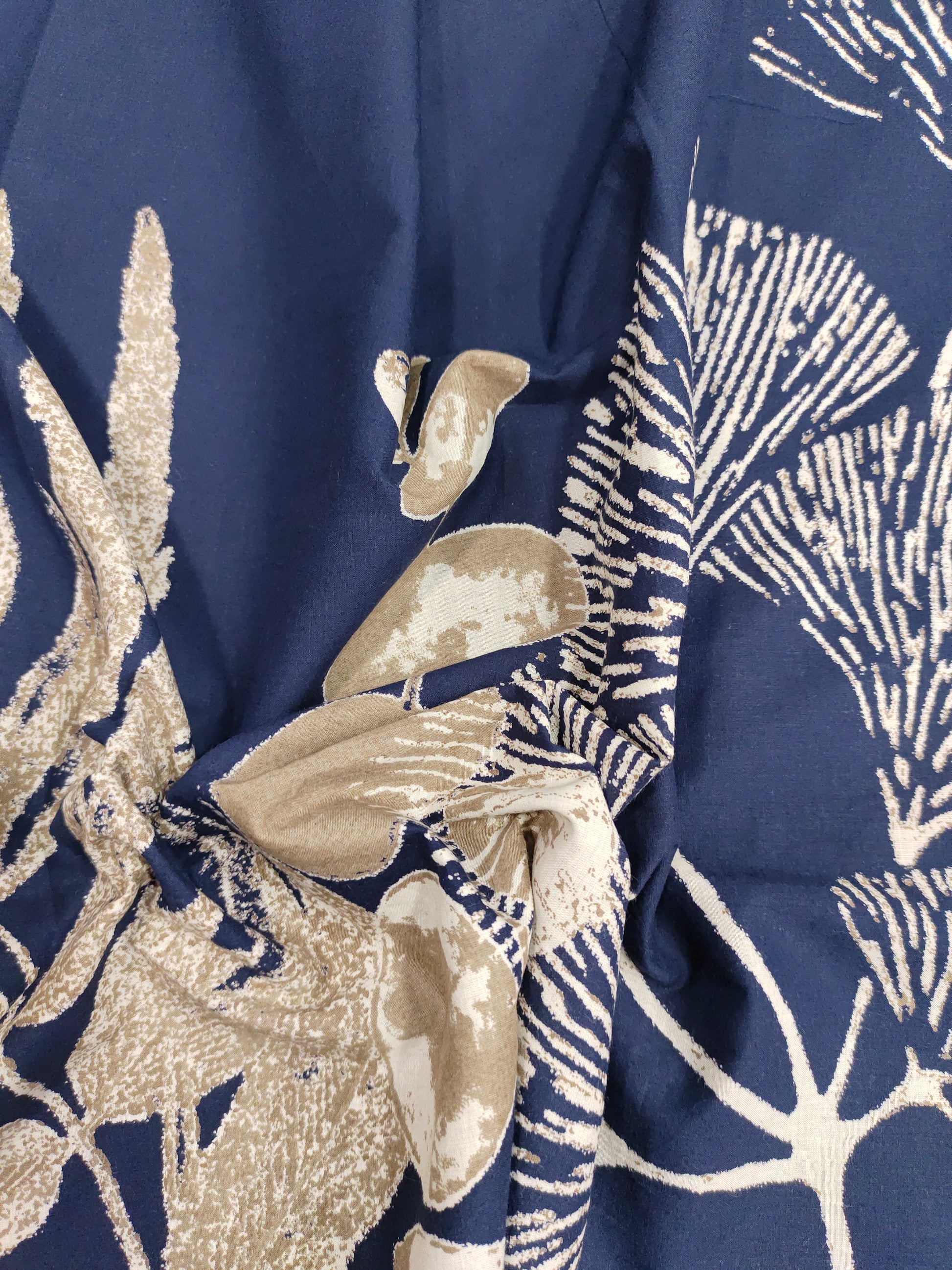 Cotton daman screen print blue fabric with beige floral print.