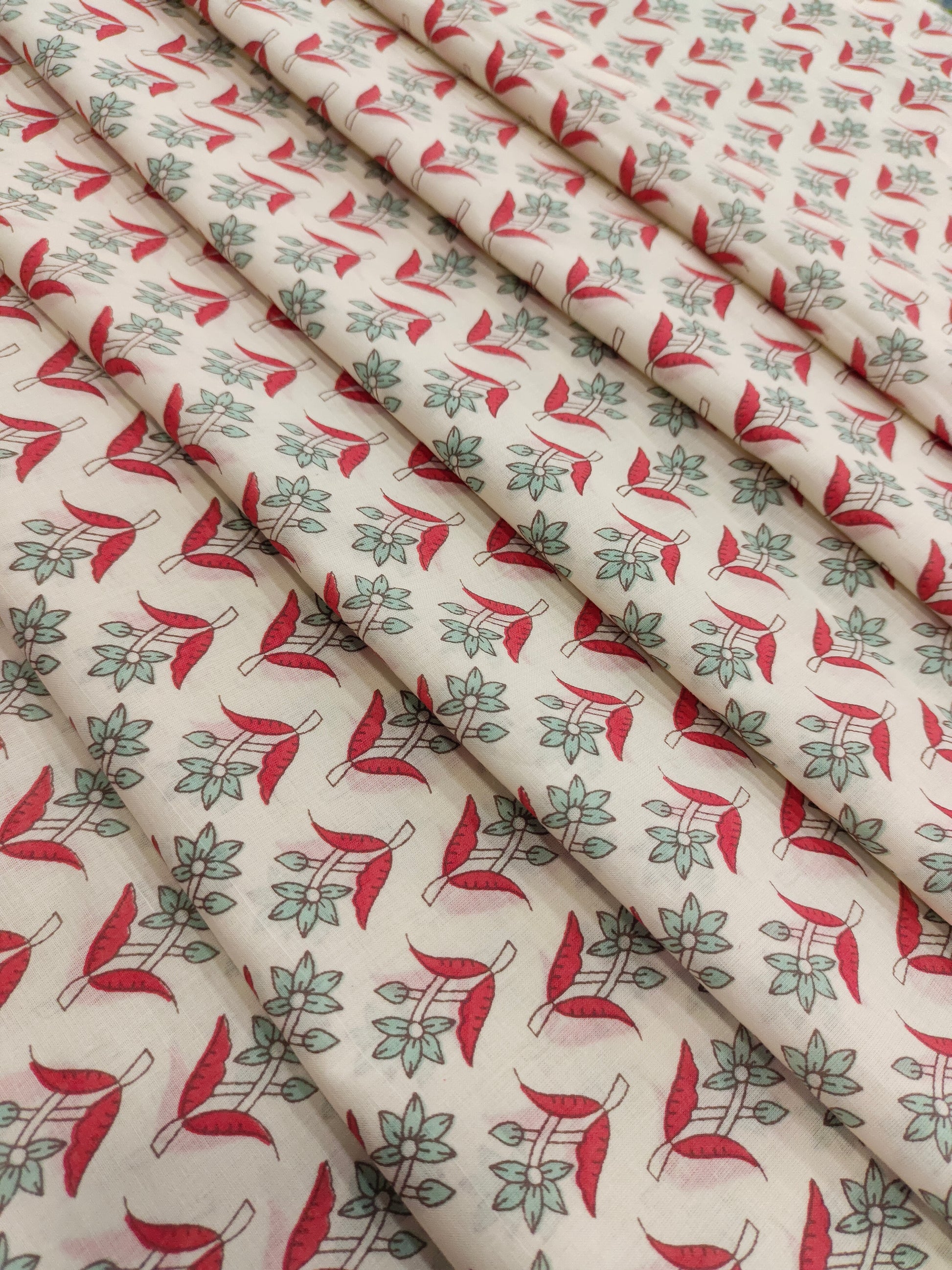 Cotton print with light green and tomato color