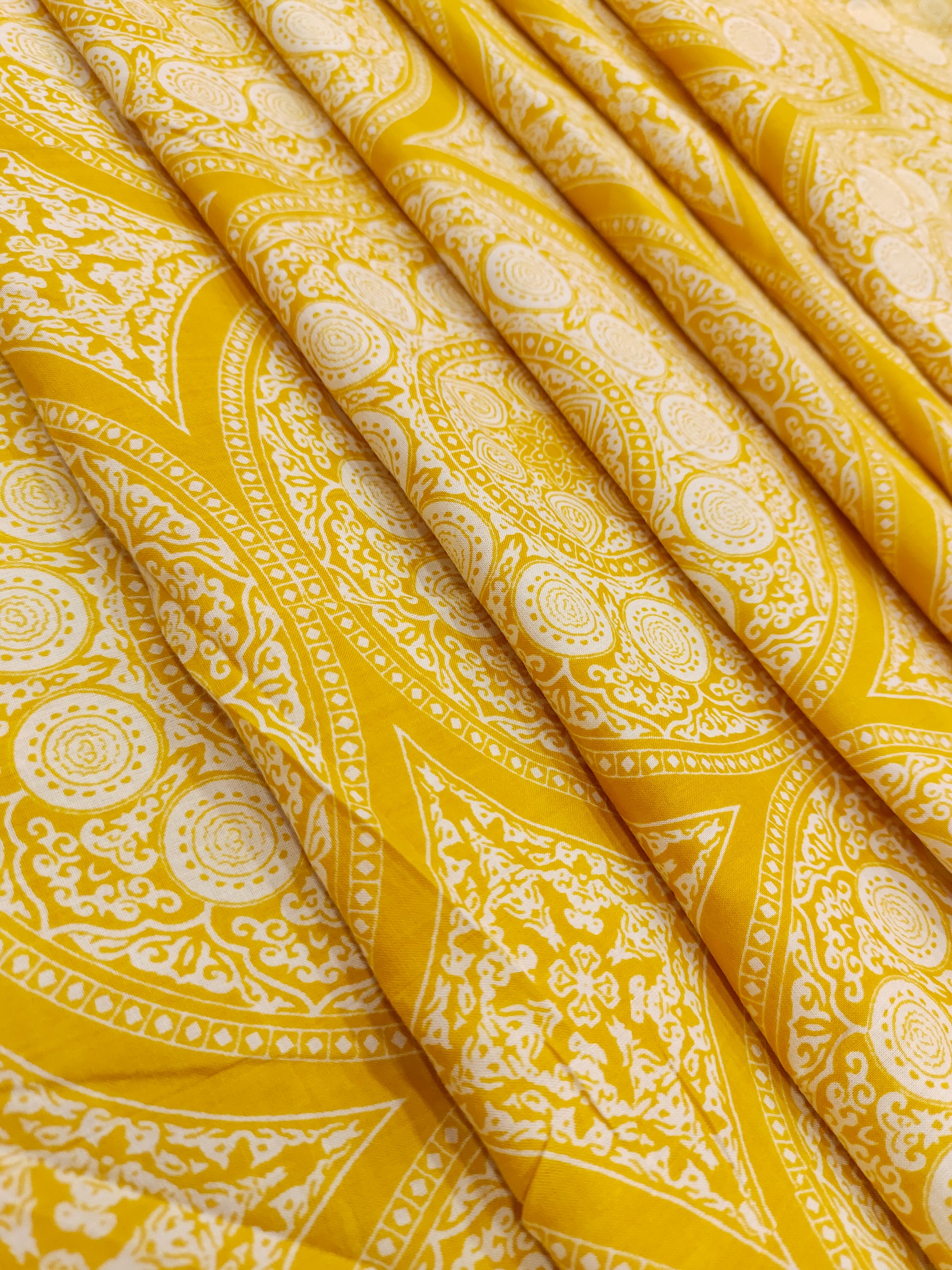 Yellow circular cotton printed