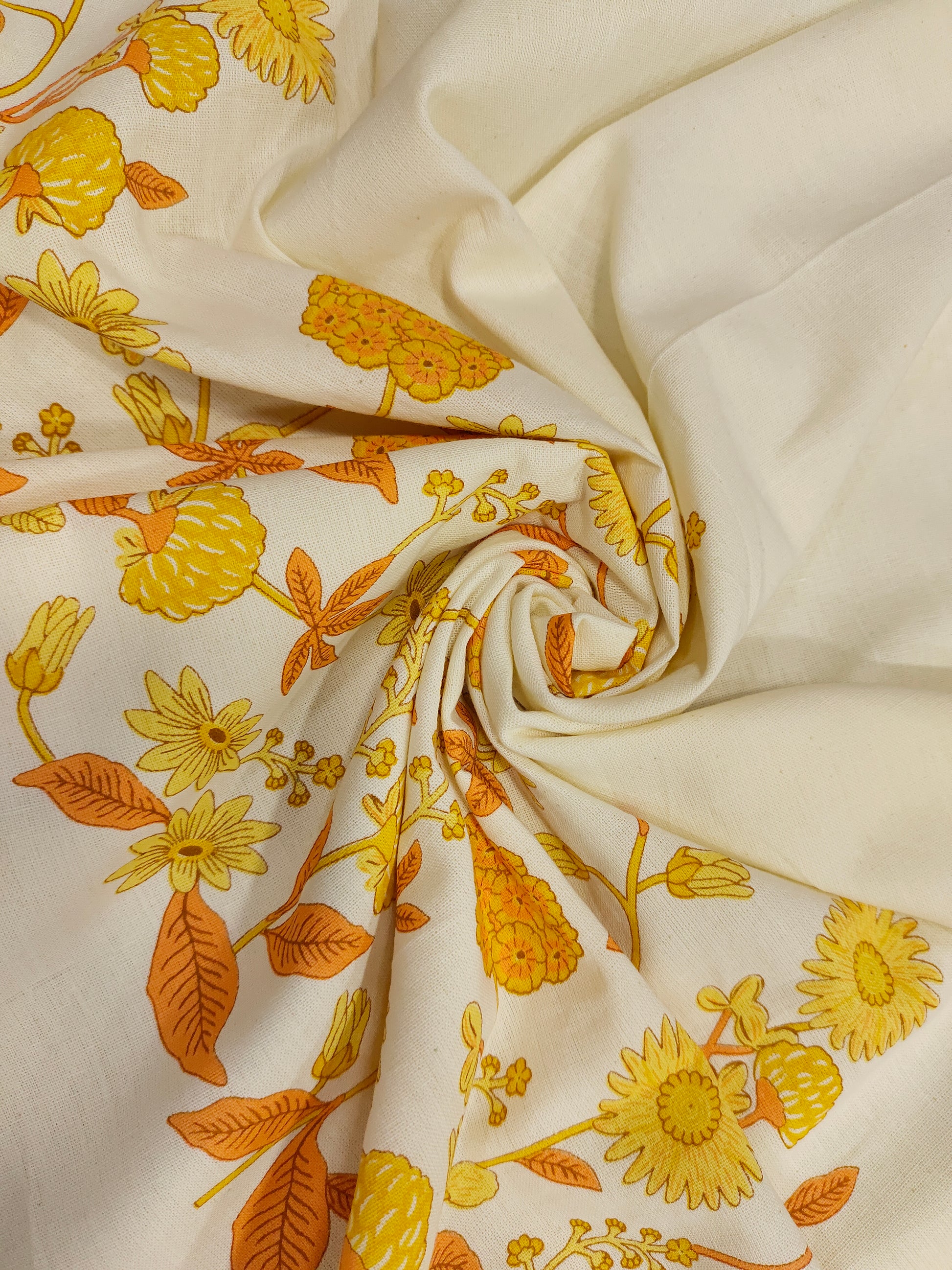 Cotton flex daman print with orange and yellow