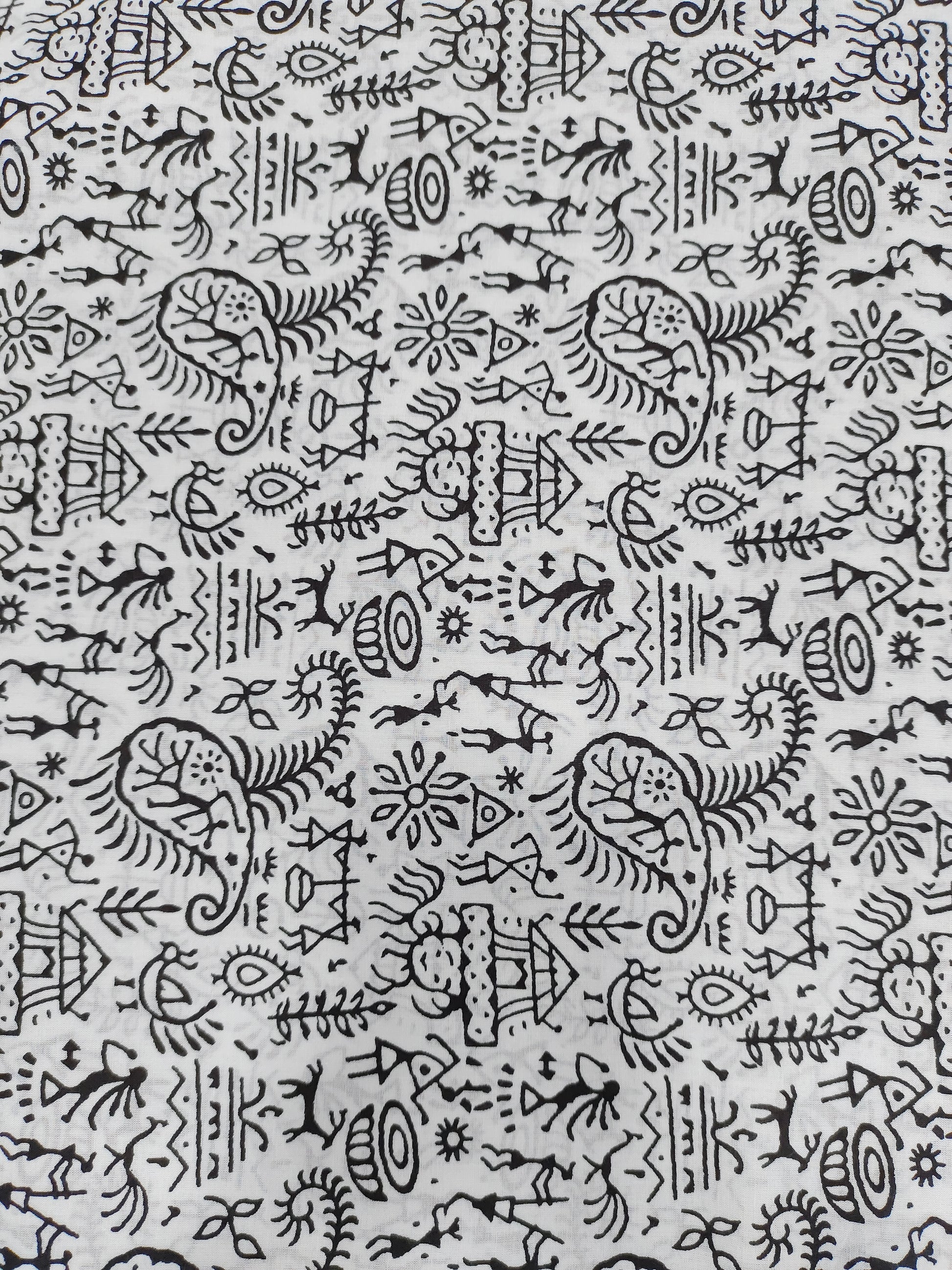 White and black allover screen print.