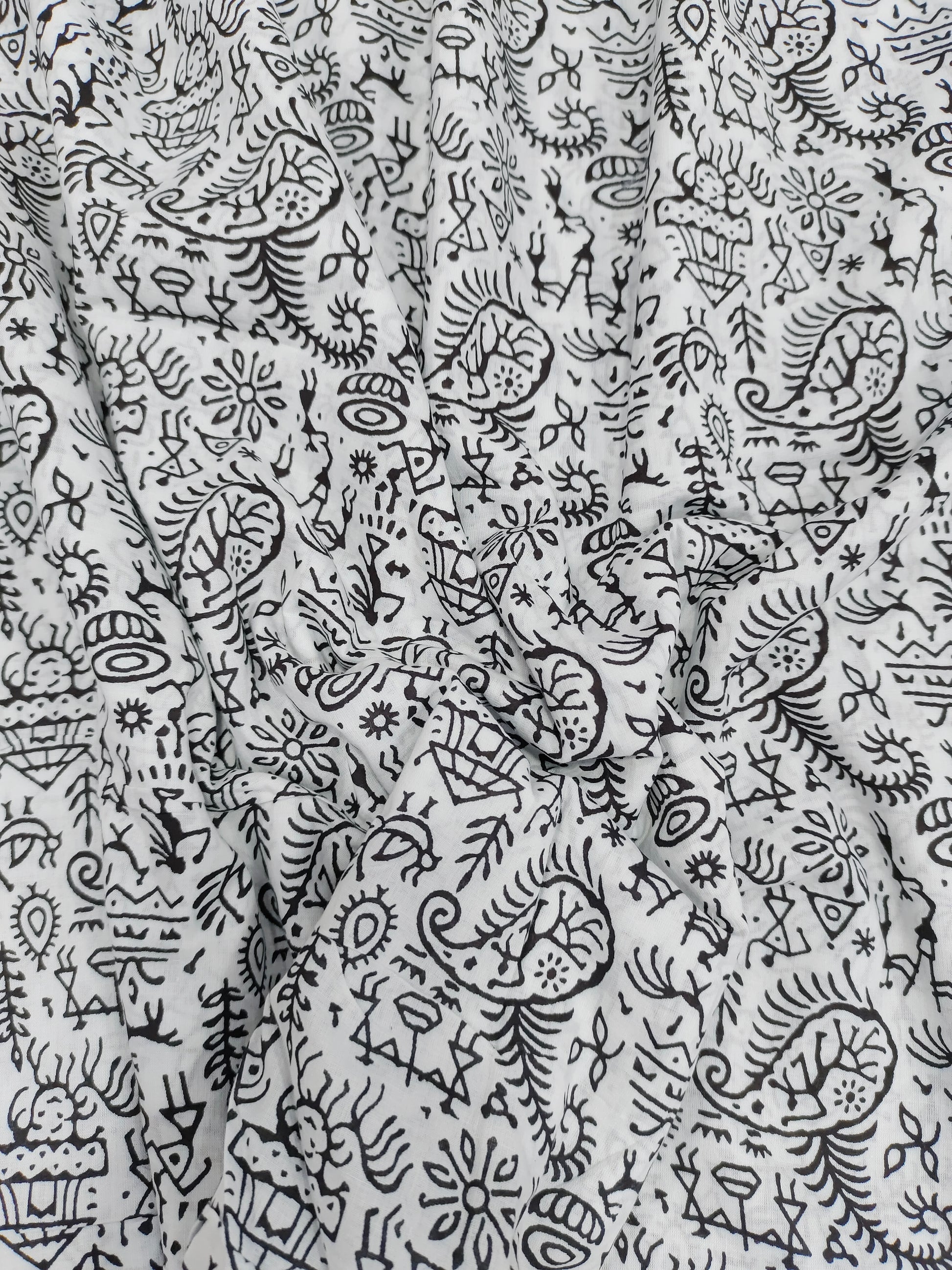 White and black allover screen print.