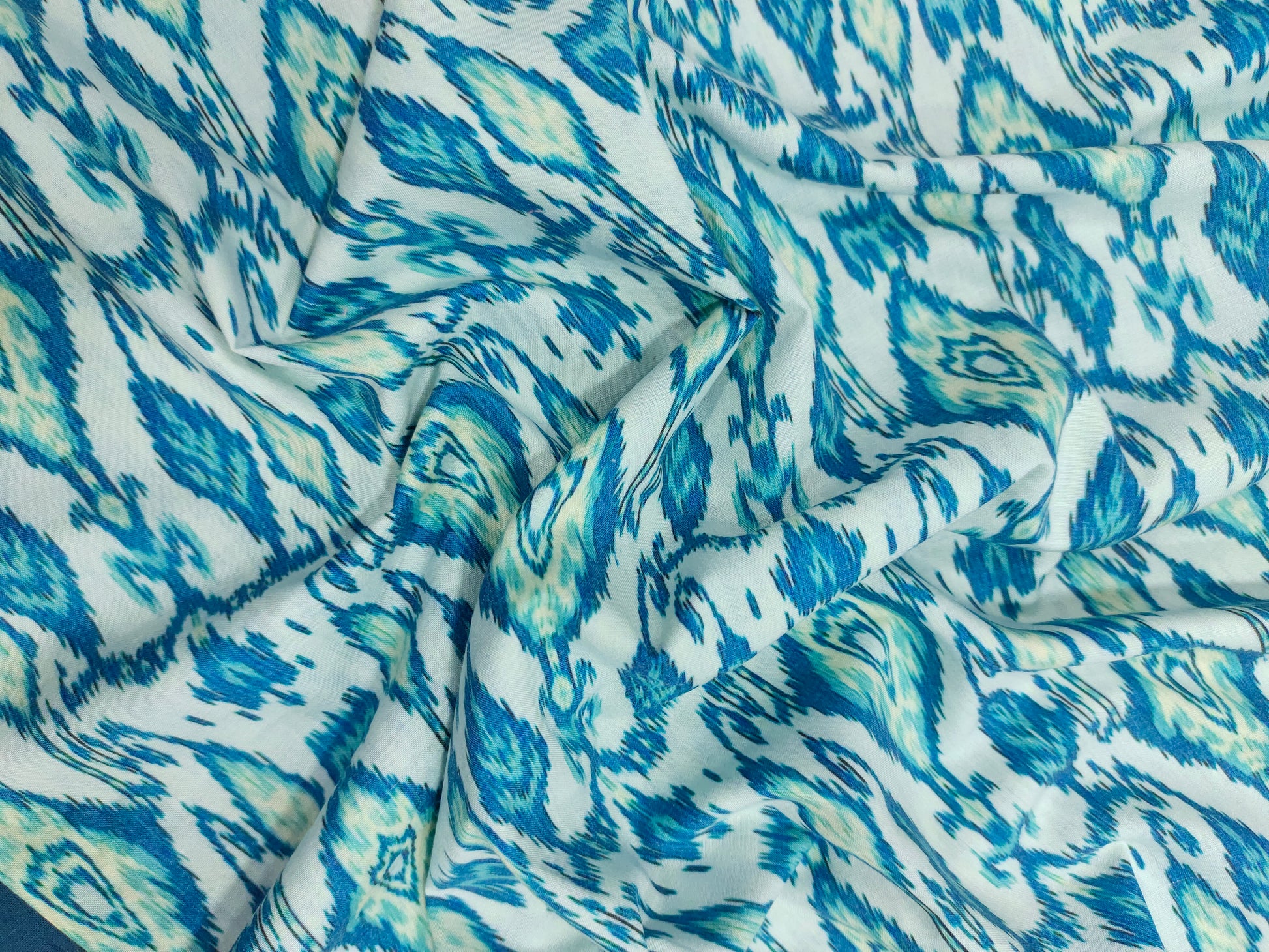 Cotton digital print with with 2 shades of blue.