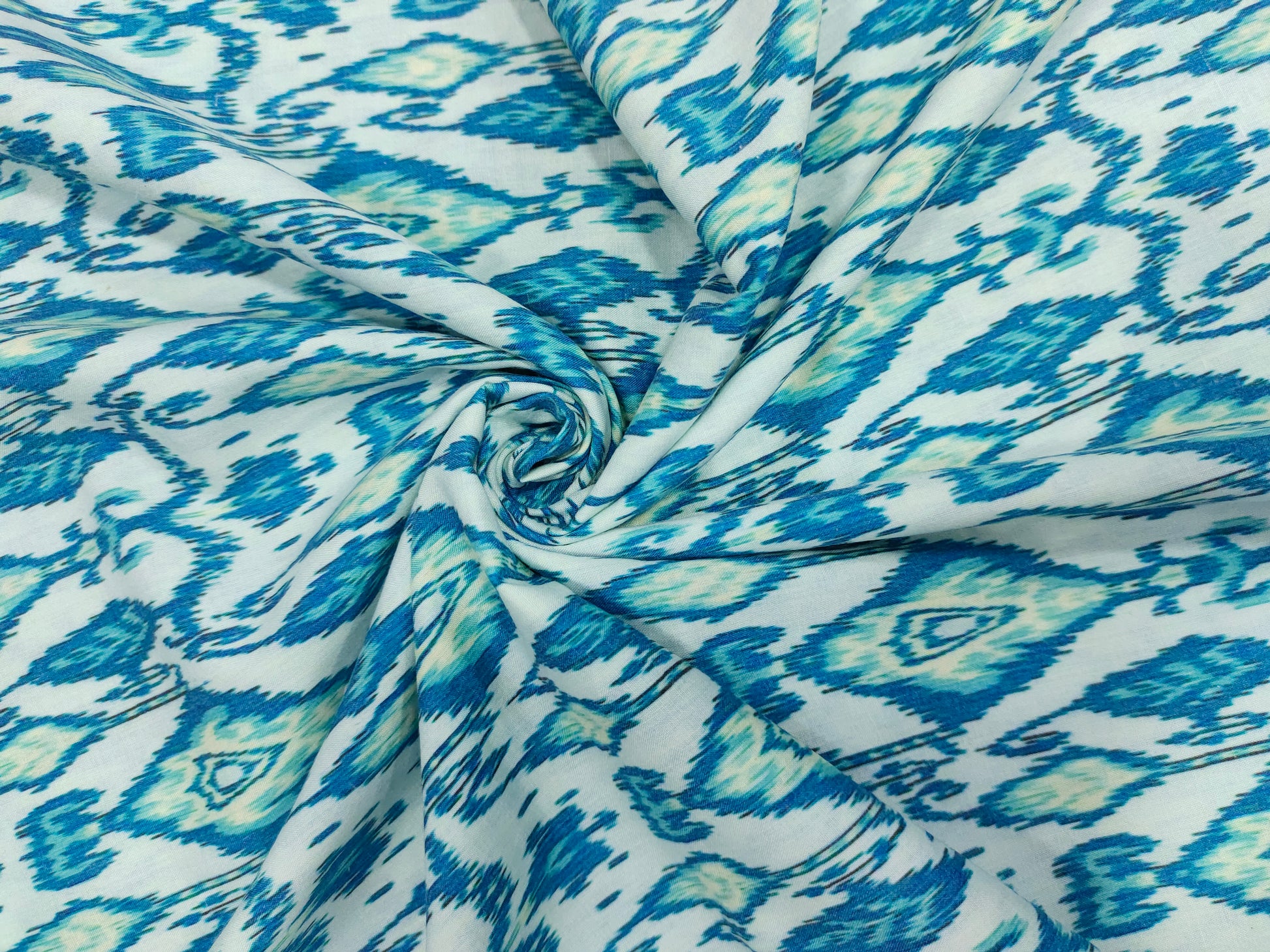 Cotton digital print with with 2 shades of blue.