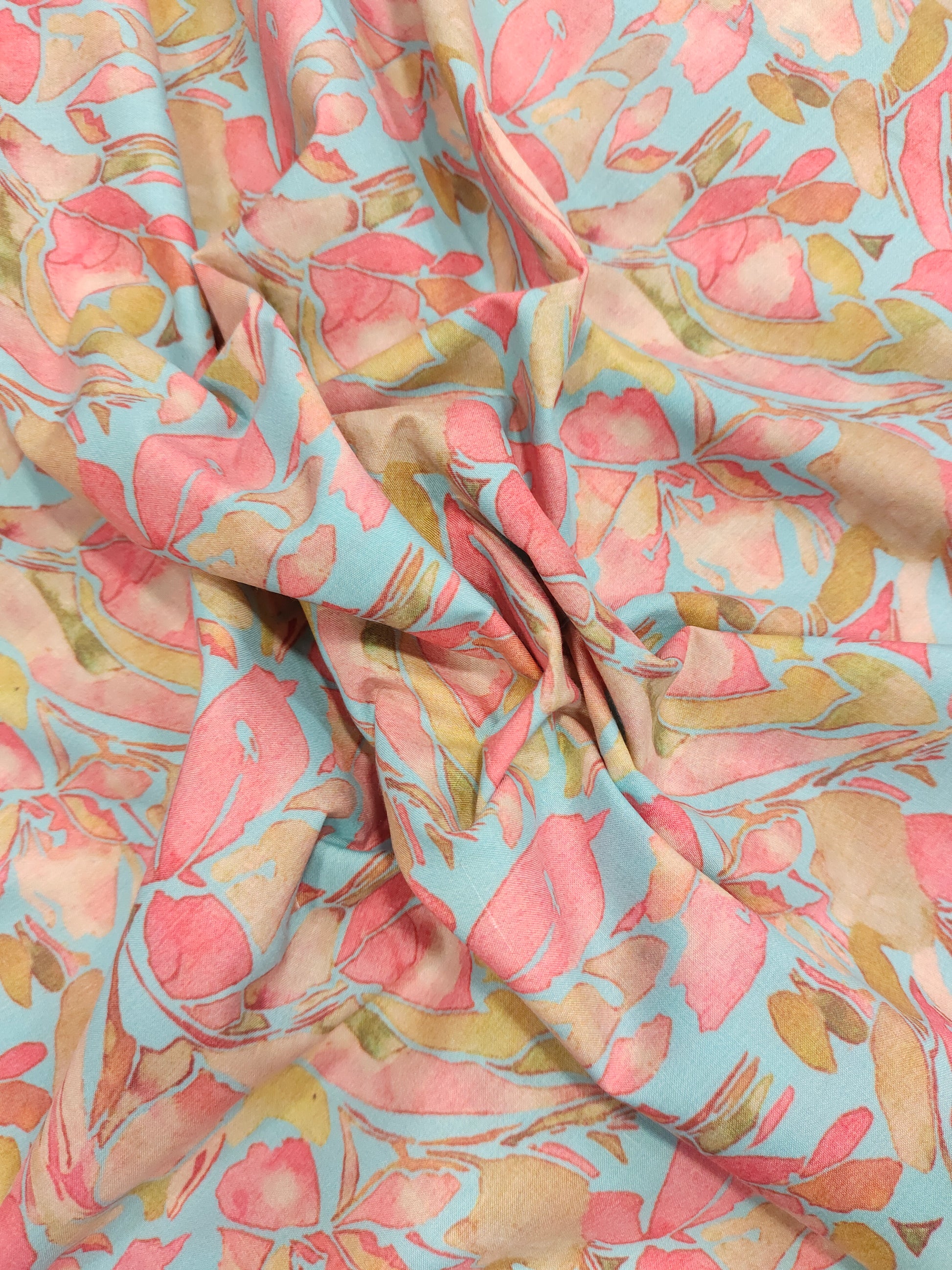 Cotton sea blue base fabric with digital print of tomato and peach color.