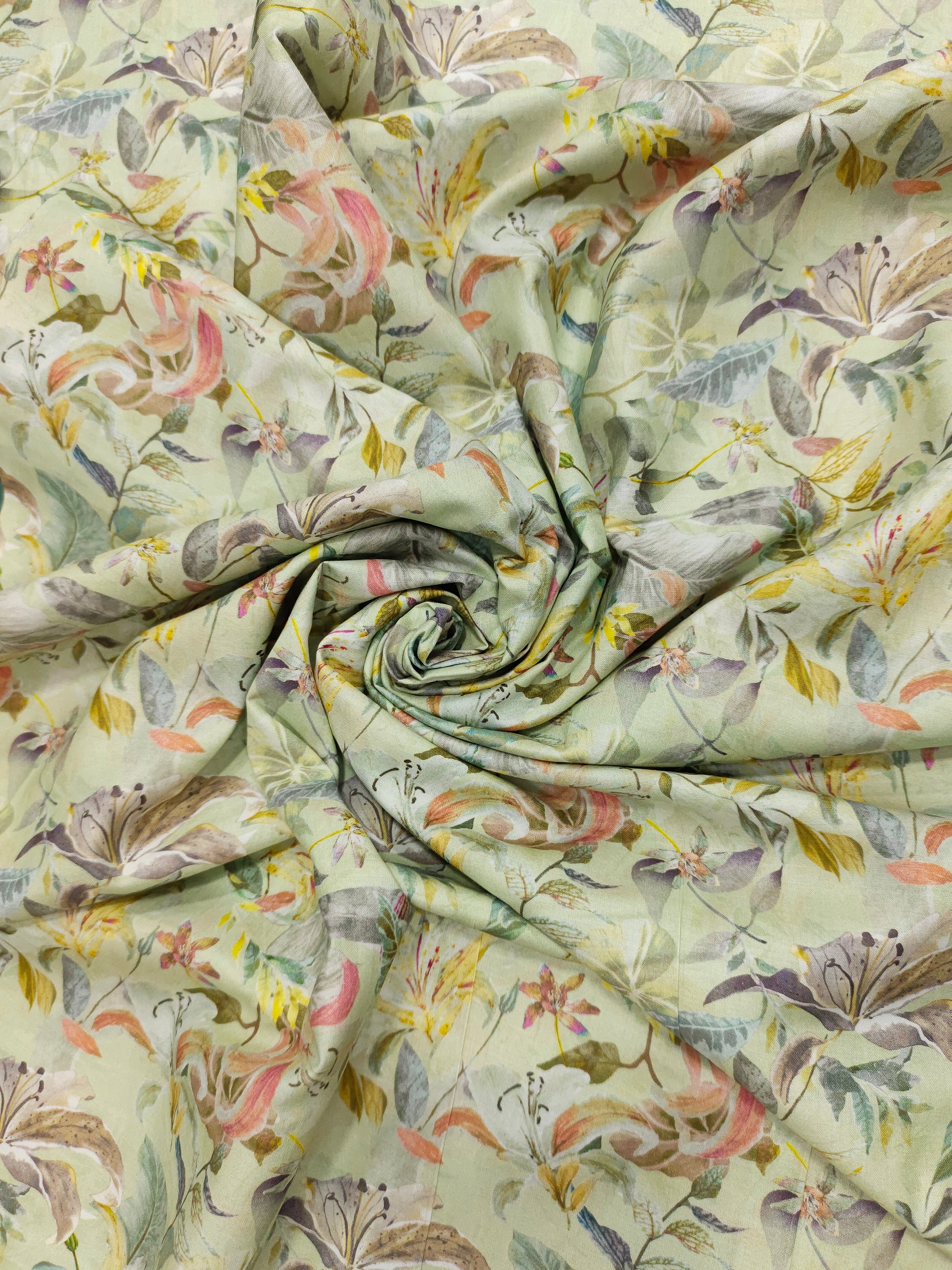 Light pista green pure cotton digital print fabric with yellow green and peach.