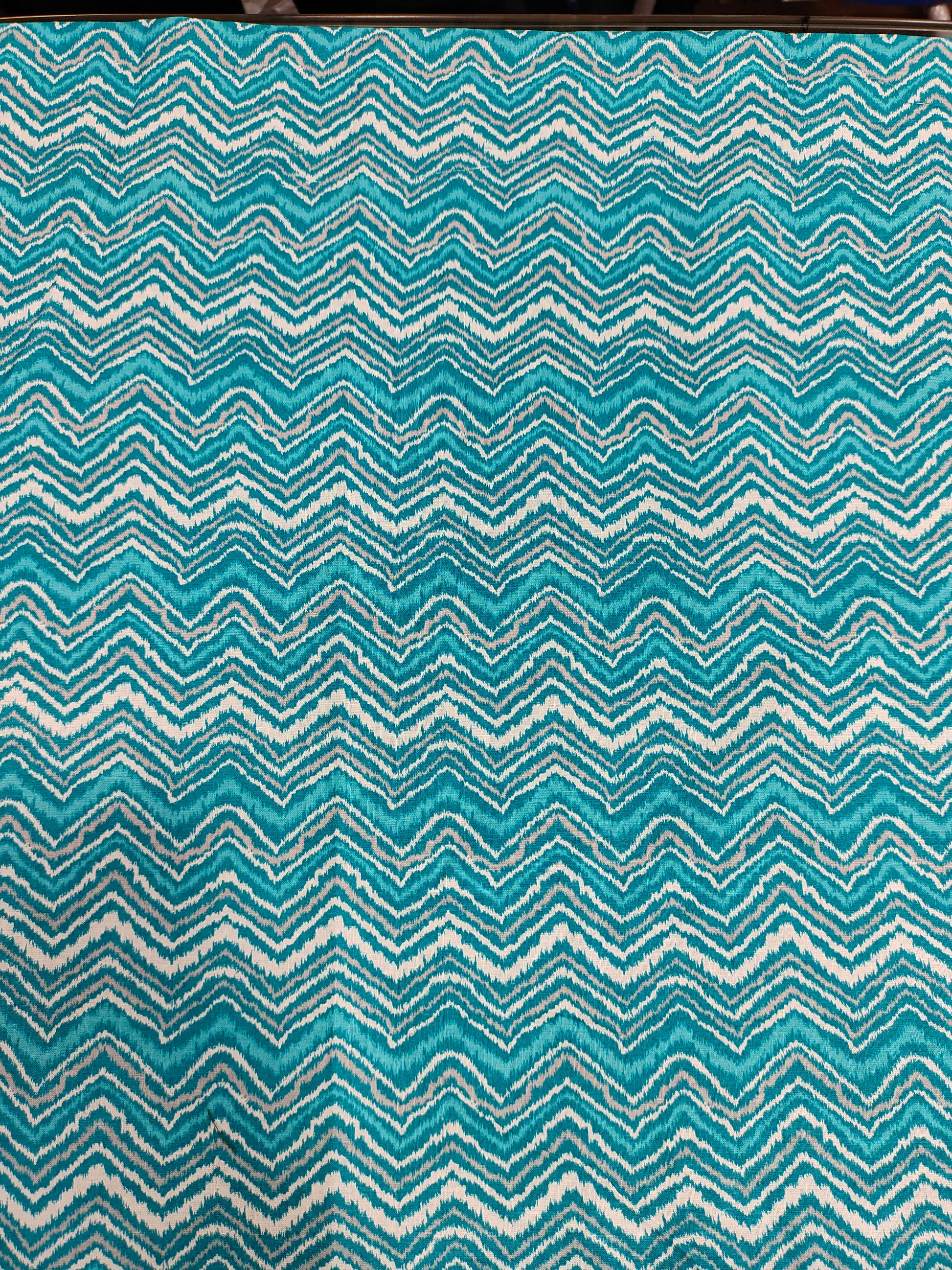 Cotton blue rick rack mill print.