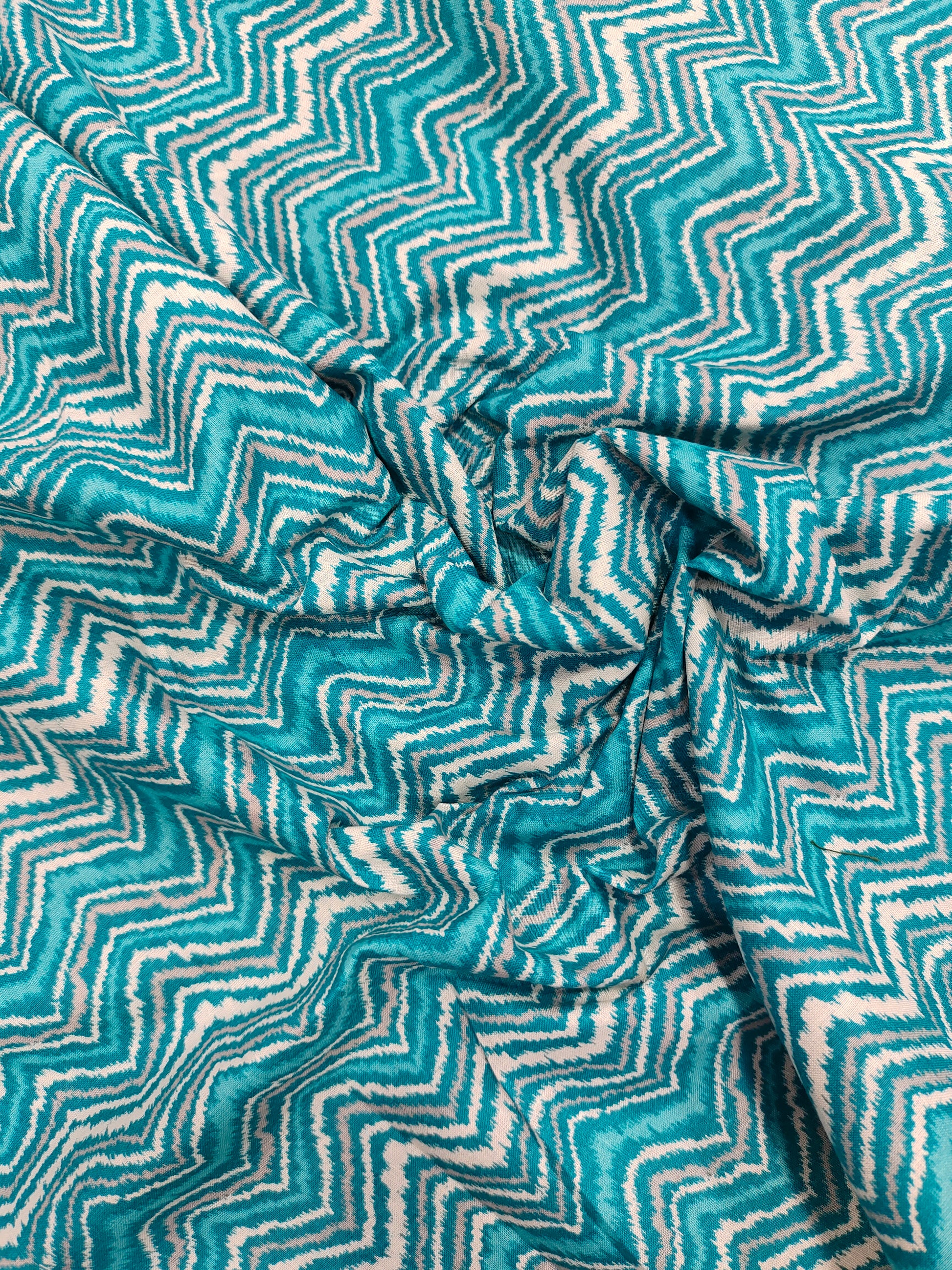 Cotton blue rick rack mill print.