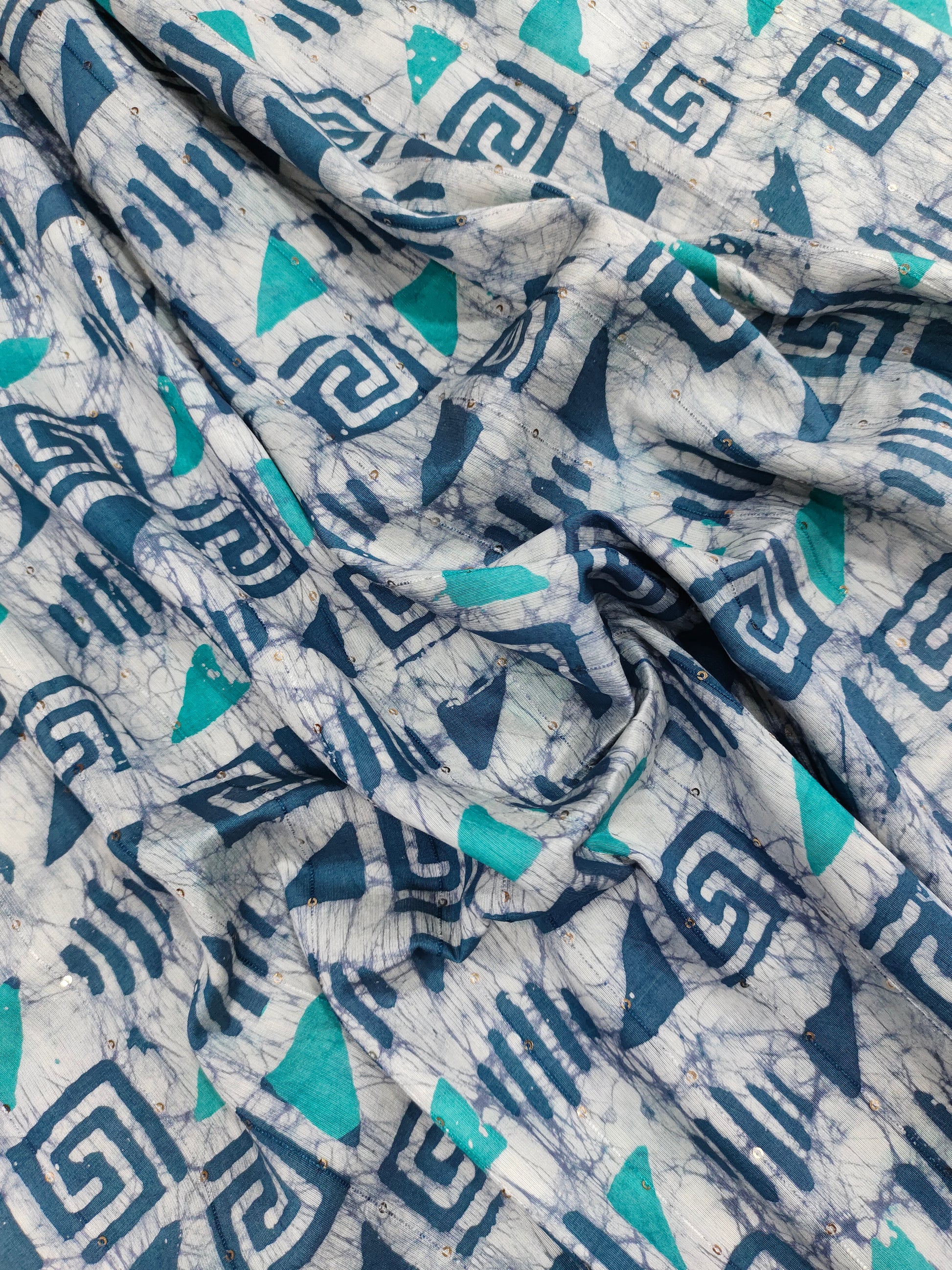 Chanderi silk batiq print with blue and green added gold sequins