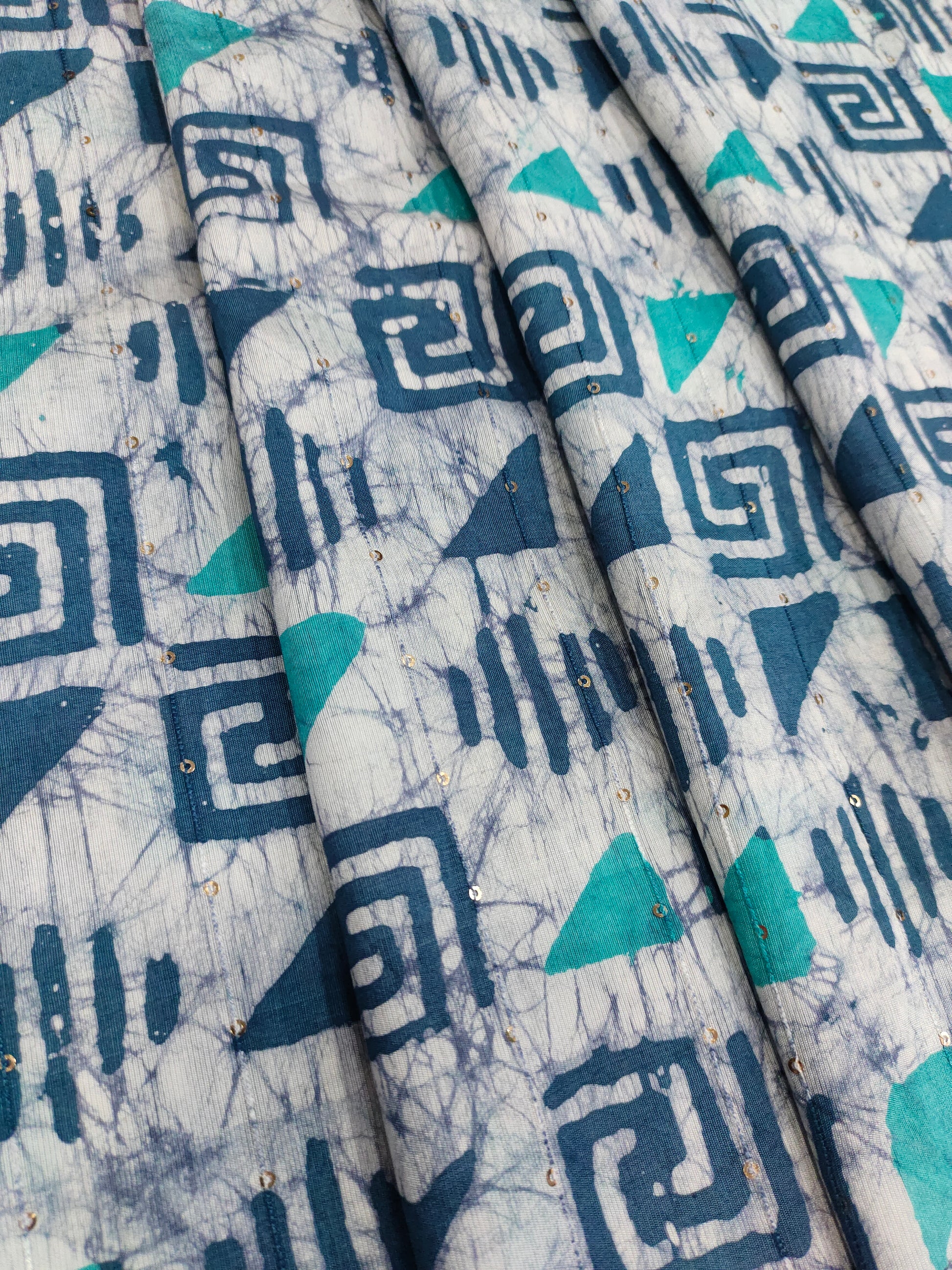 Chanderi silk batiq print with blue and green added gold sequins