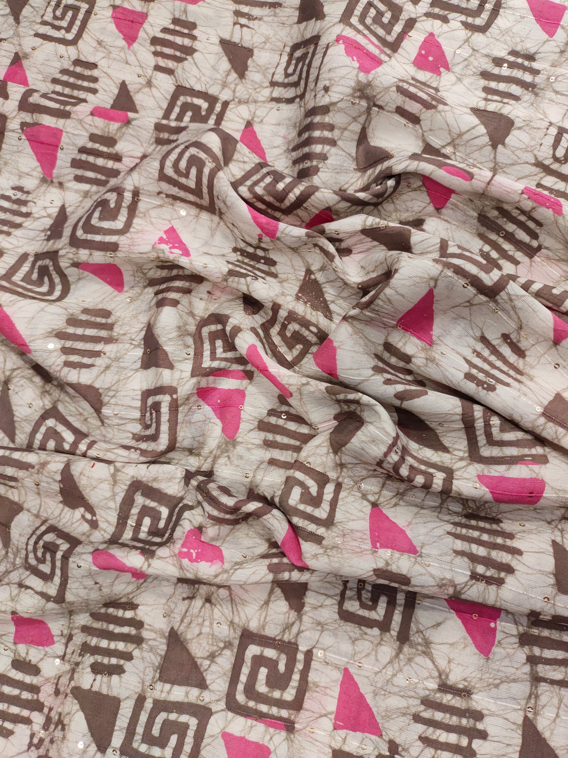 Chanderi silk batiq print with chocolate color and pink with little sequins.