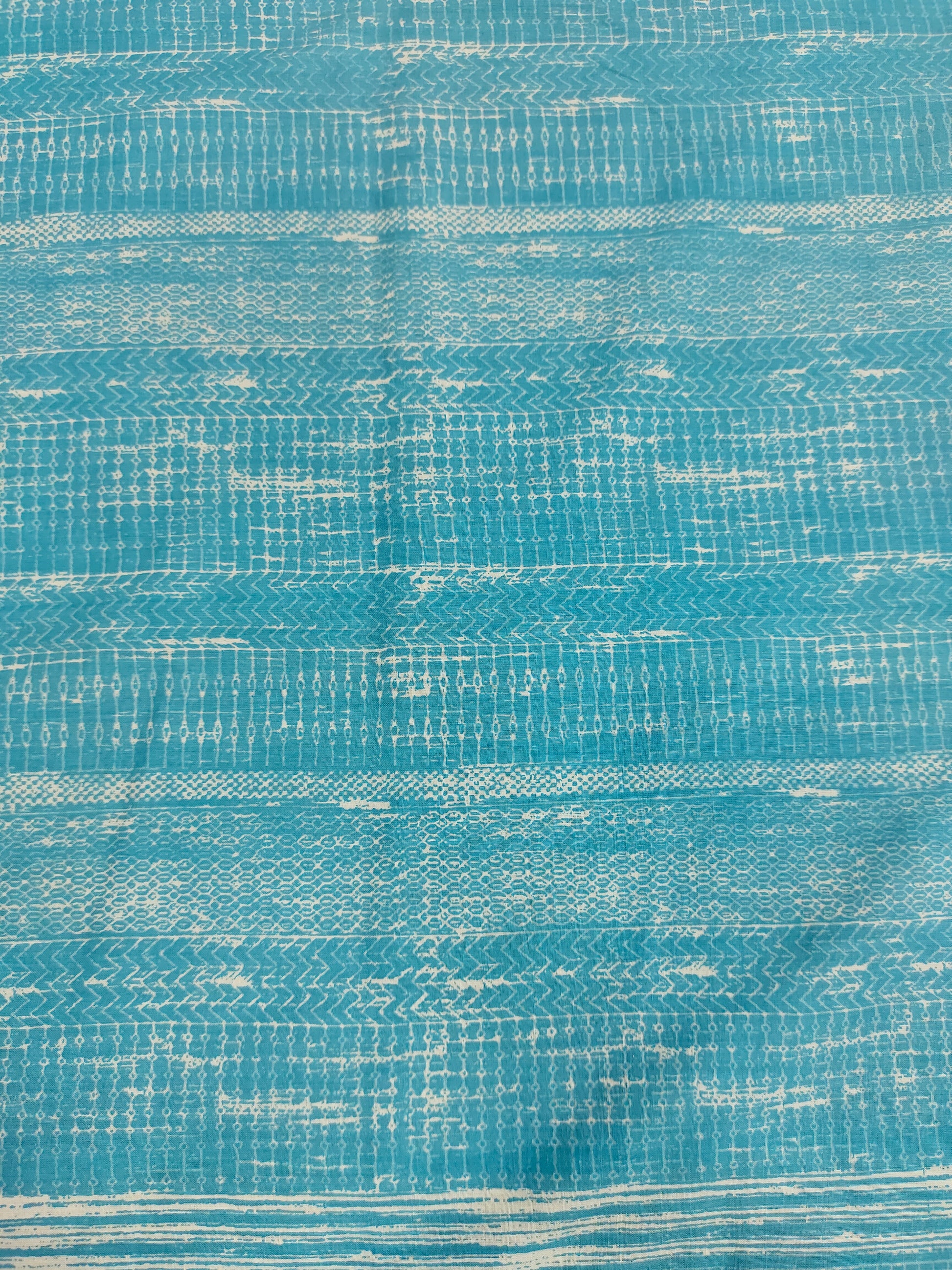 Light peacock blue screen print fabric