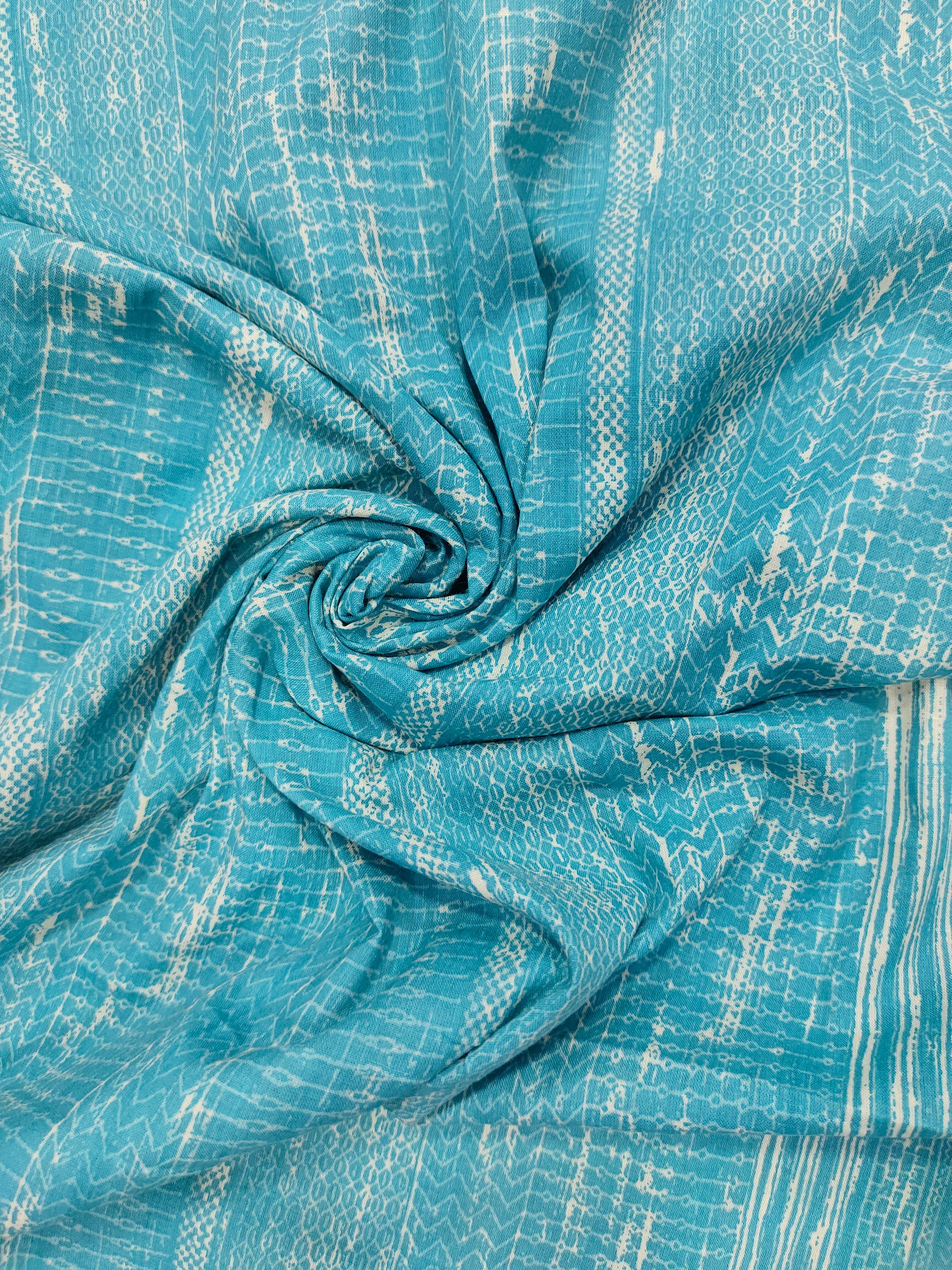 Light peacock blue screen print fabric