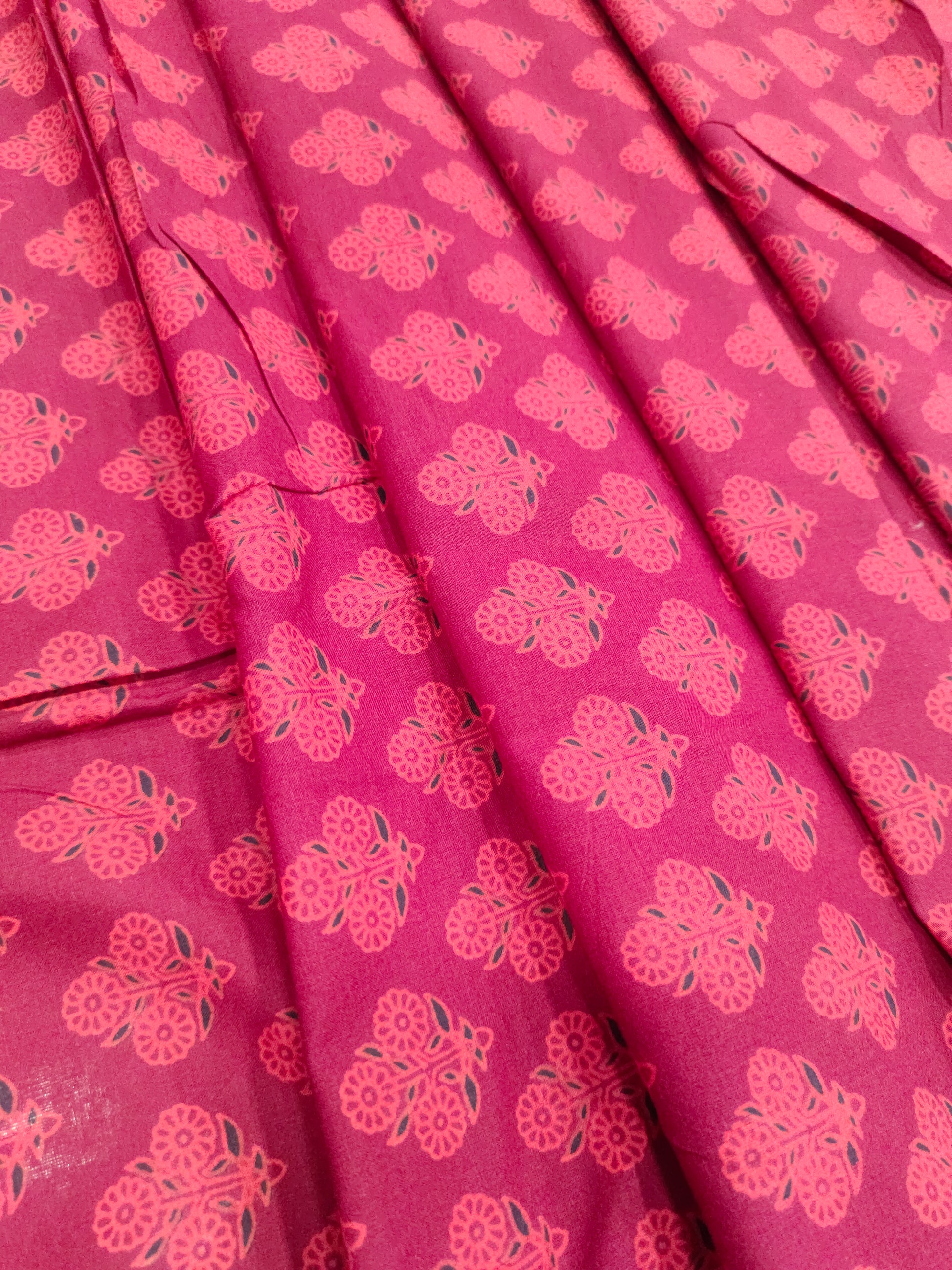 Maroon cotton ajrak print with red color.