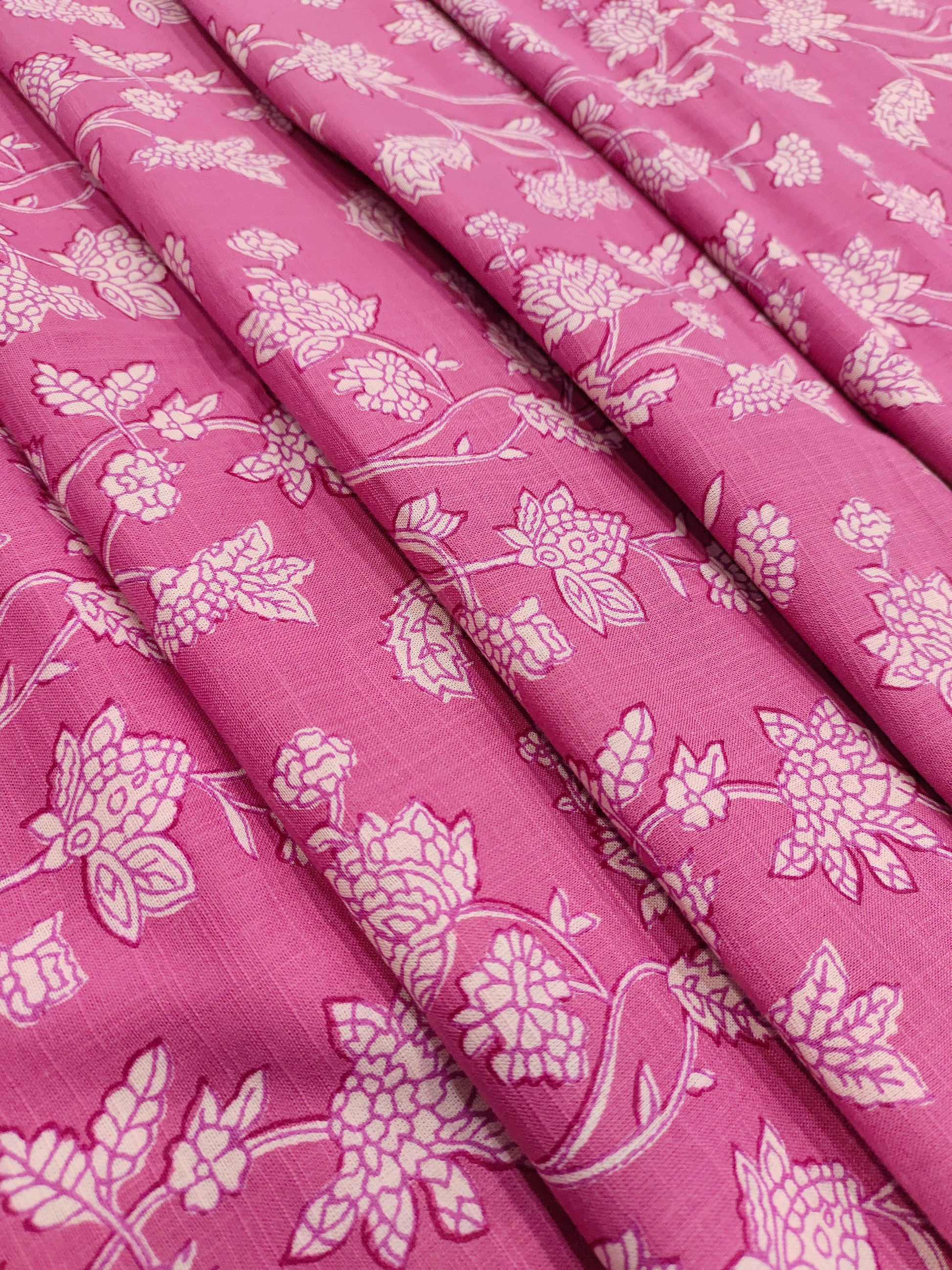 Pink cotton slub printed fabric all over jaal.