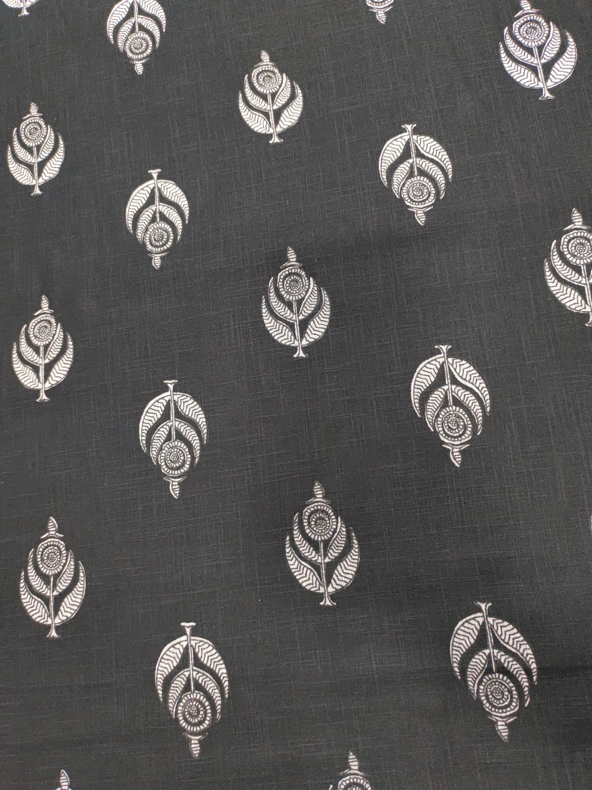 Black cotton slub fabric with offwhite moghal print