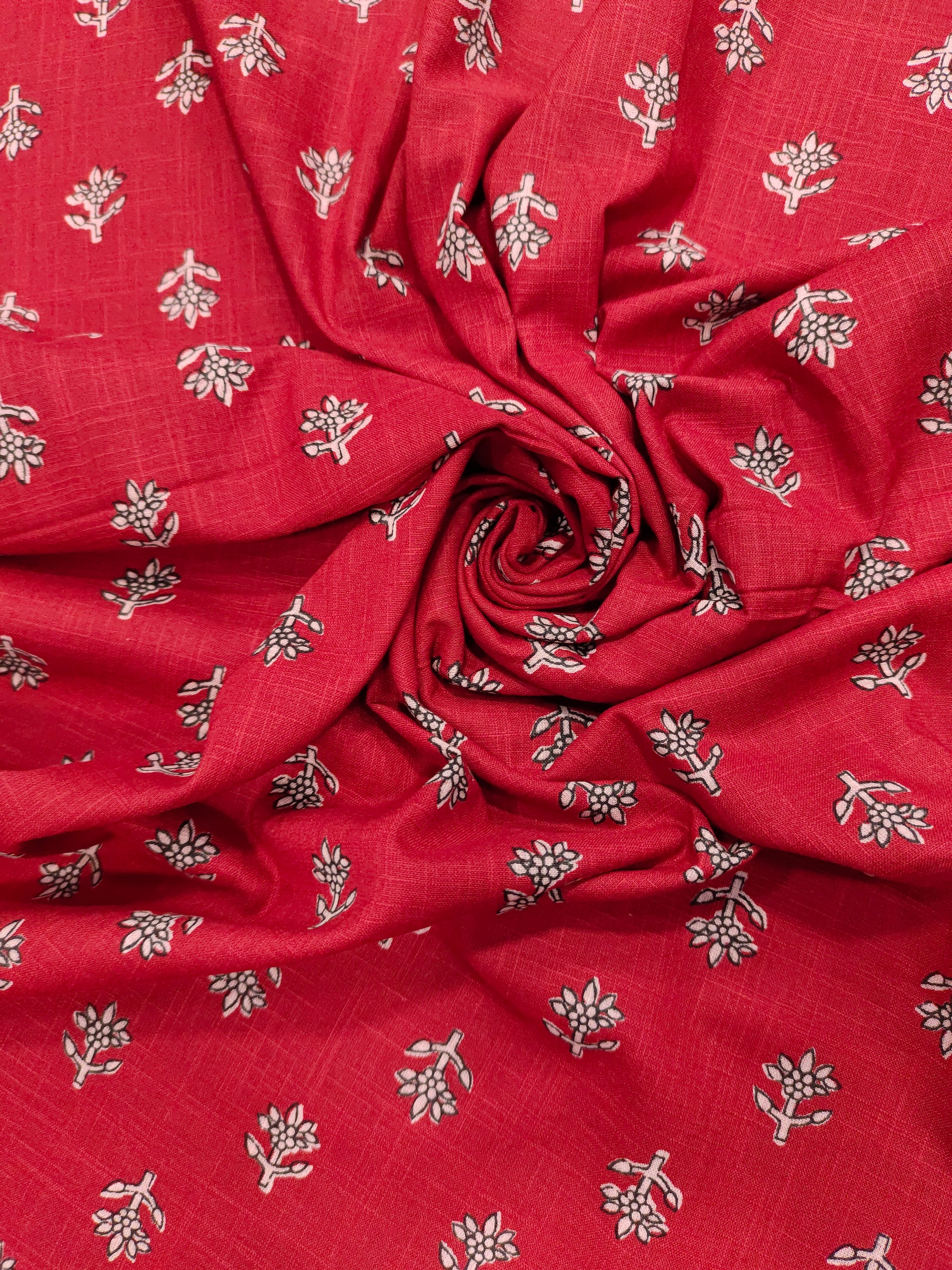 Red cotton slub small butti with black and whit.