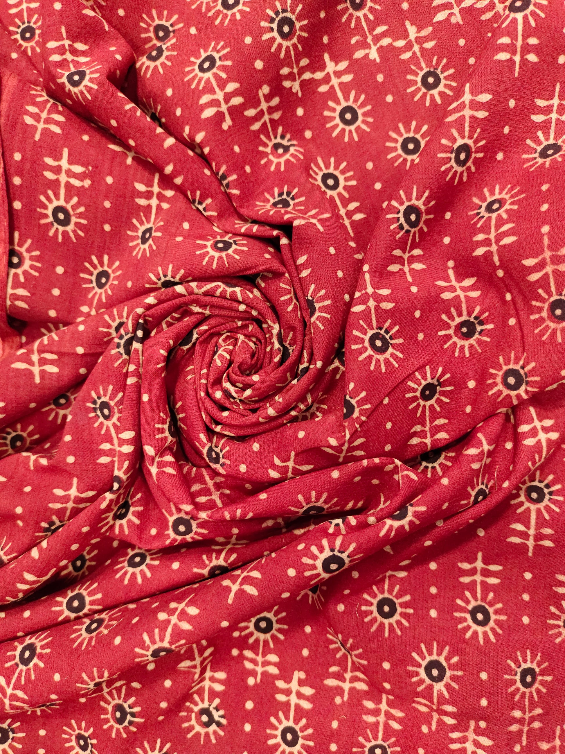 Maroon cotton ajrak print with black and beige.