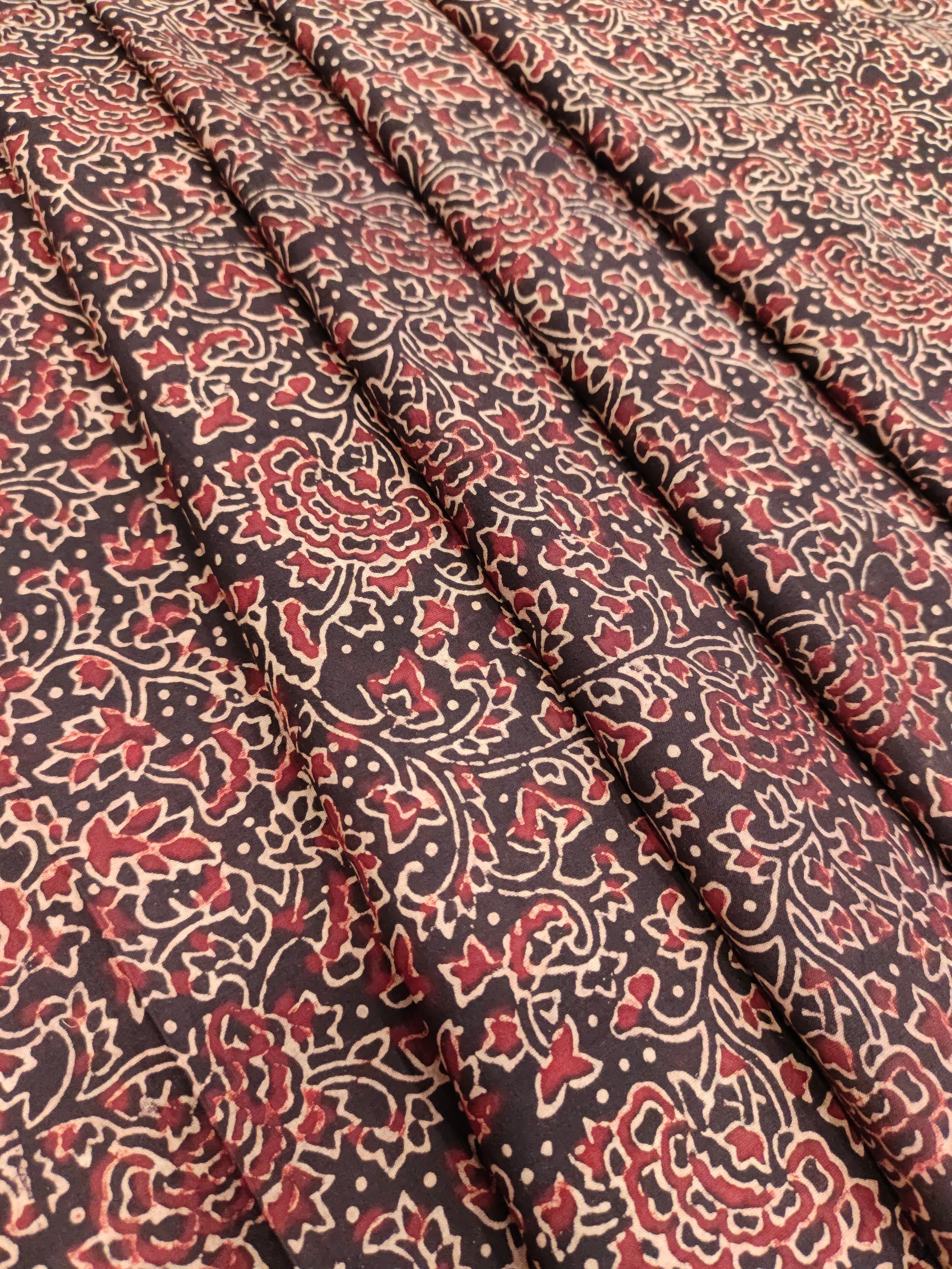 Black base cotton ajrak print with maroon and beige.