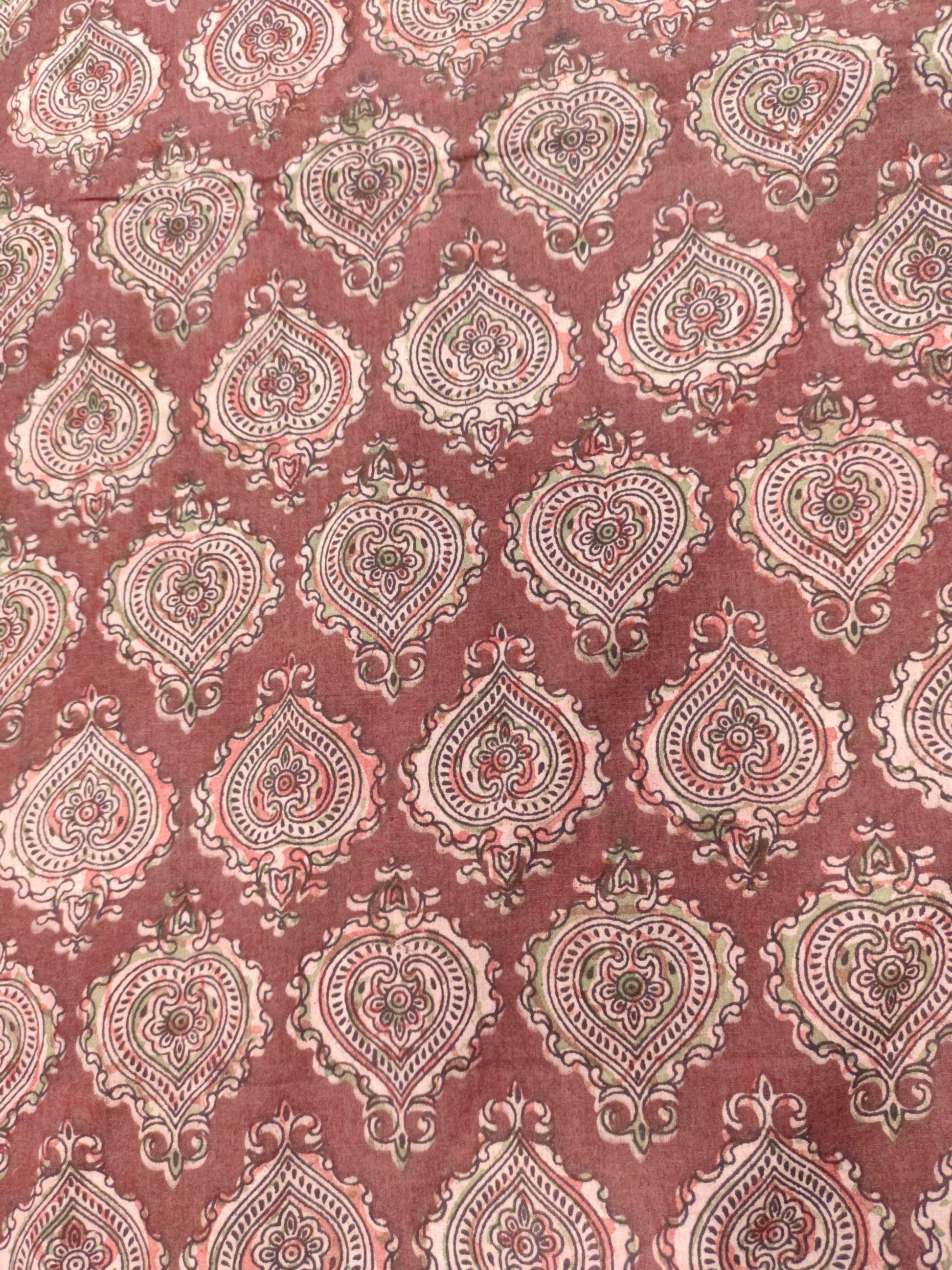 Maroon base ajrak print with black and green.