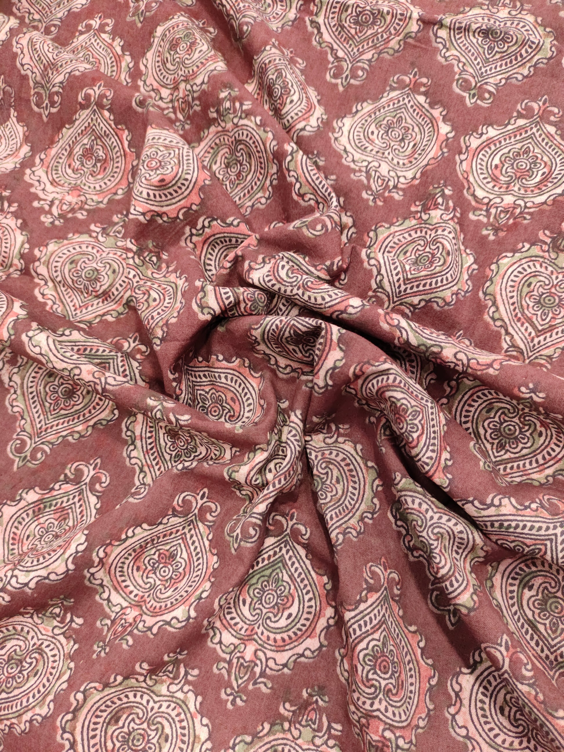 Maroon base ajrak print with black and green.