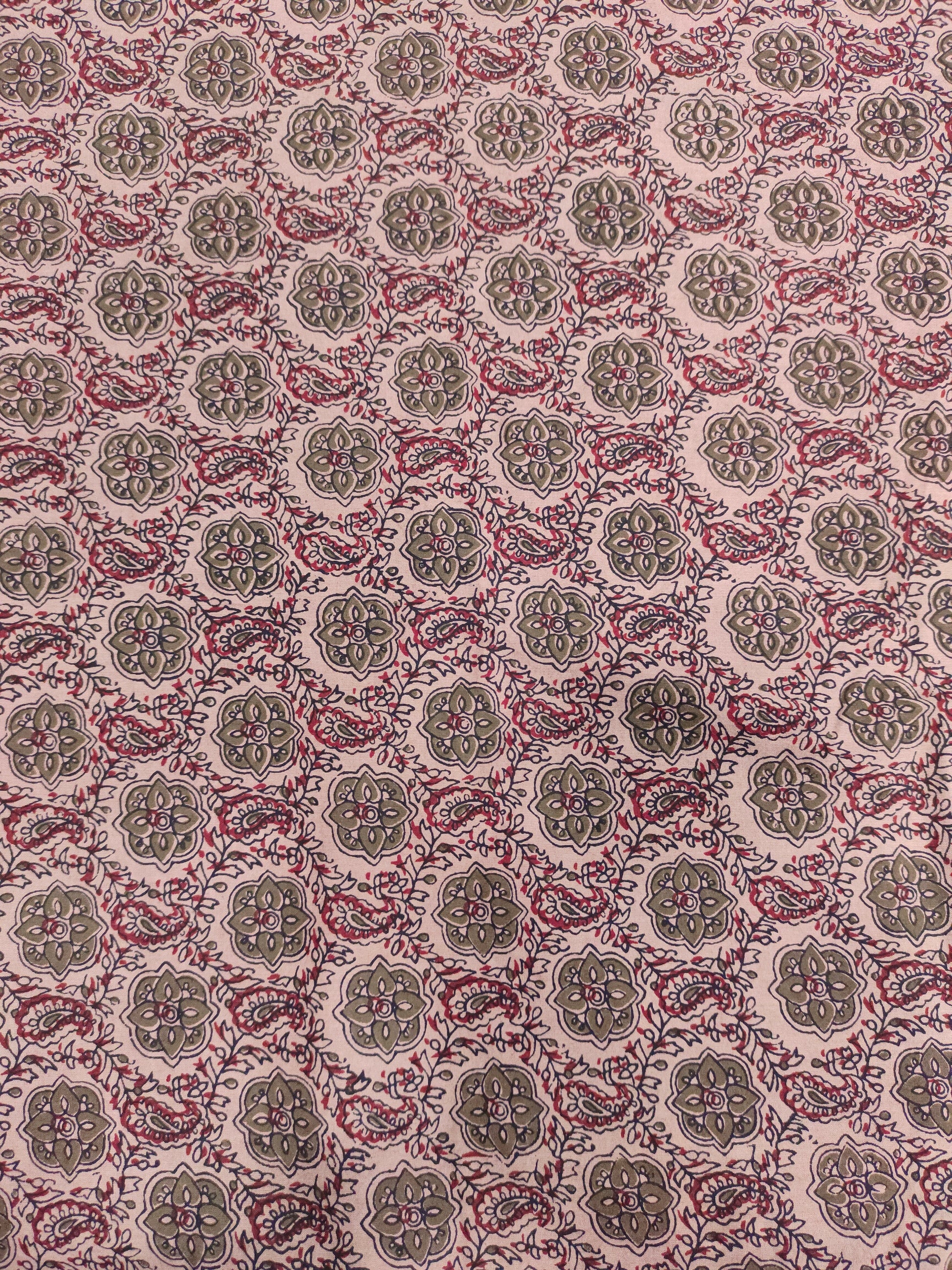 Cotton ajrak print on beige fabric with grey and maroon.