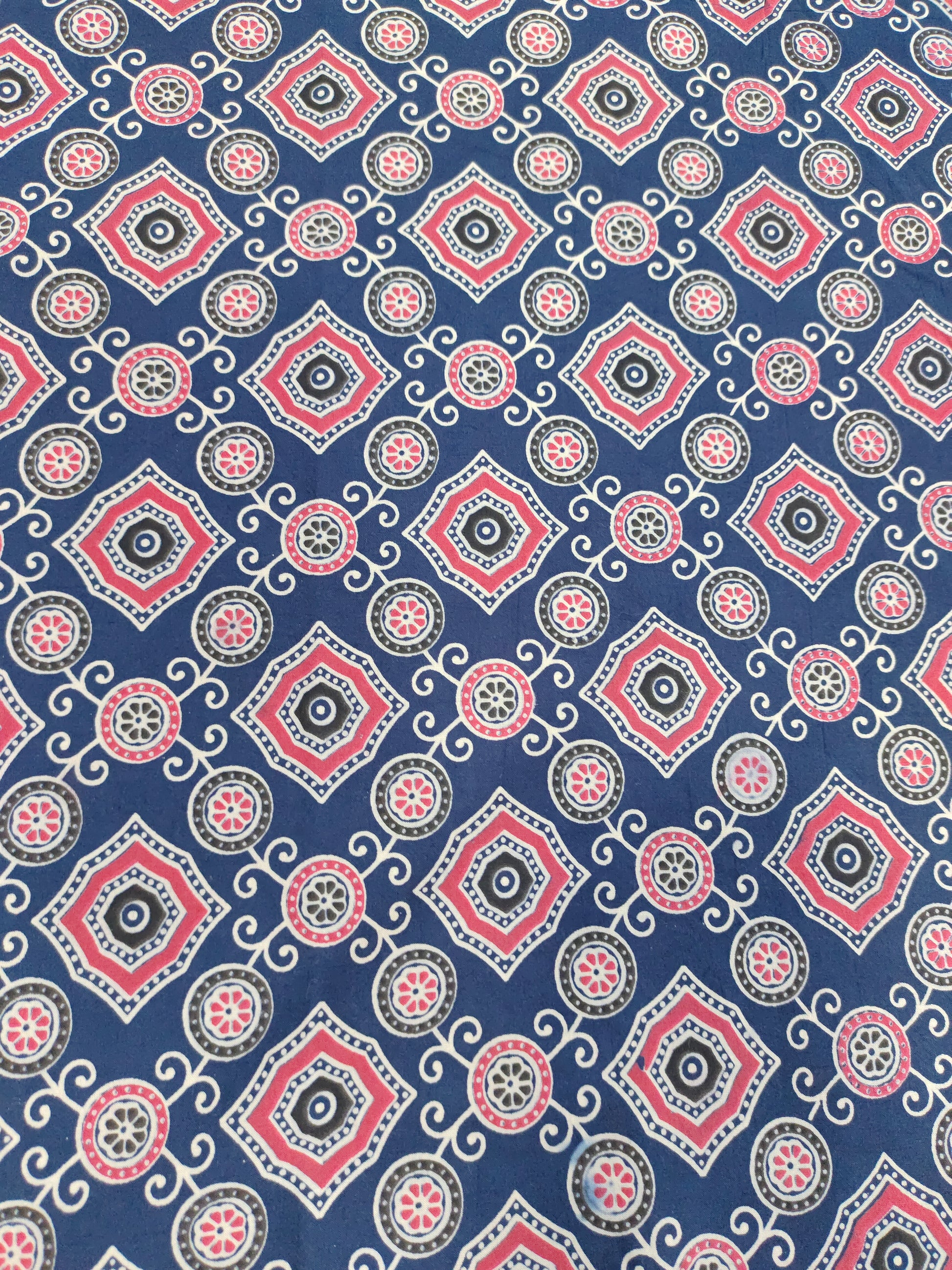Blue ajrak print allover with red and white.
