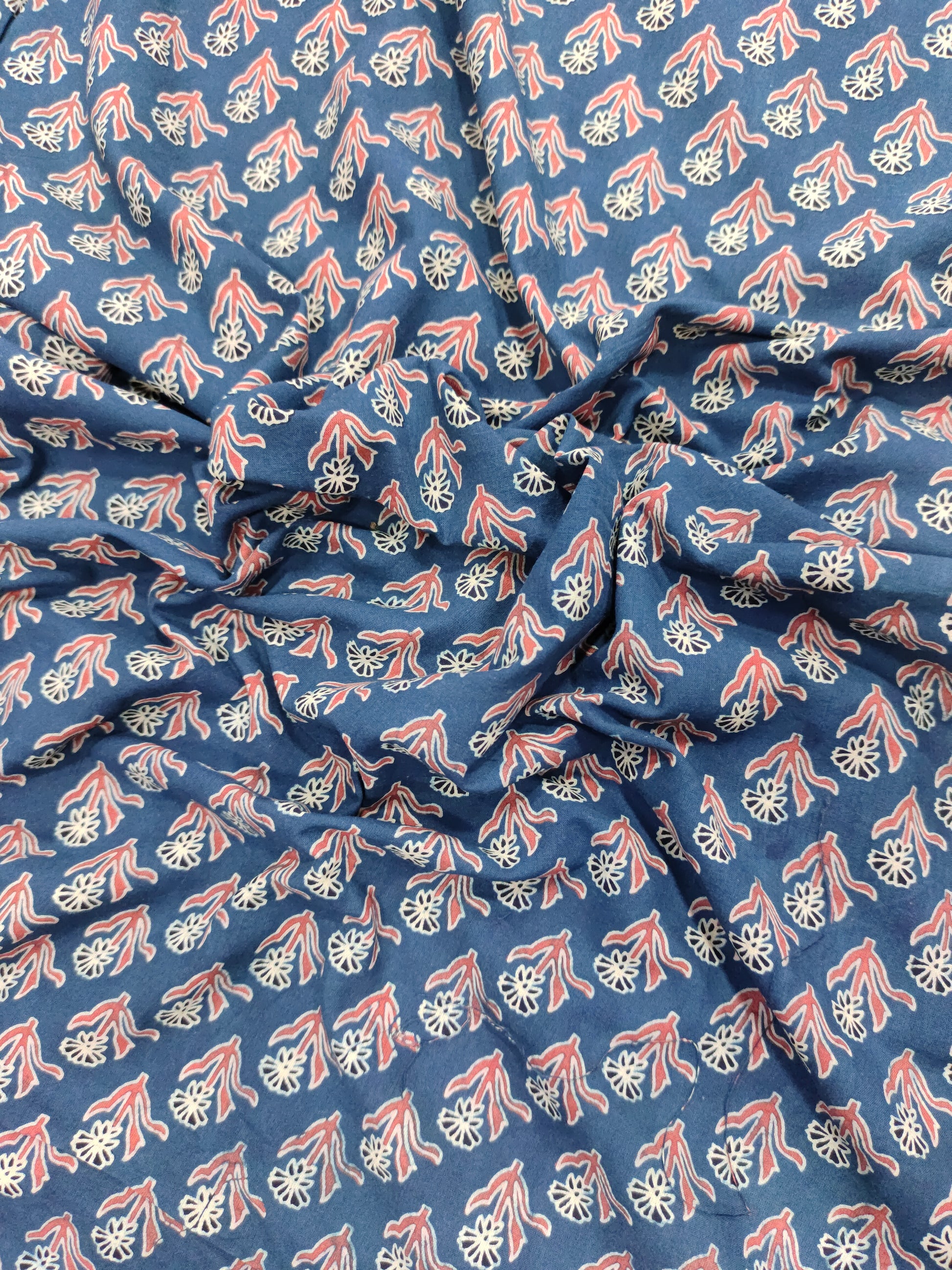 Blue base cotton fabric ajrak print with maroon and offwhite.