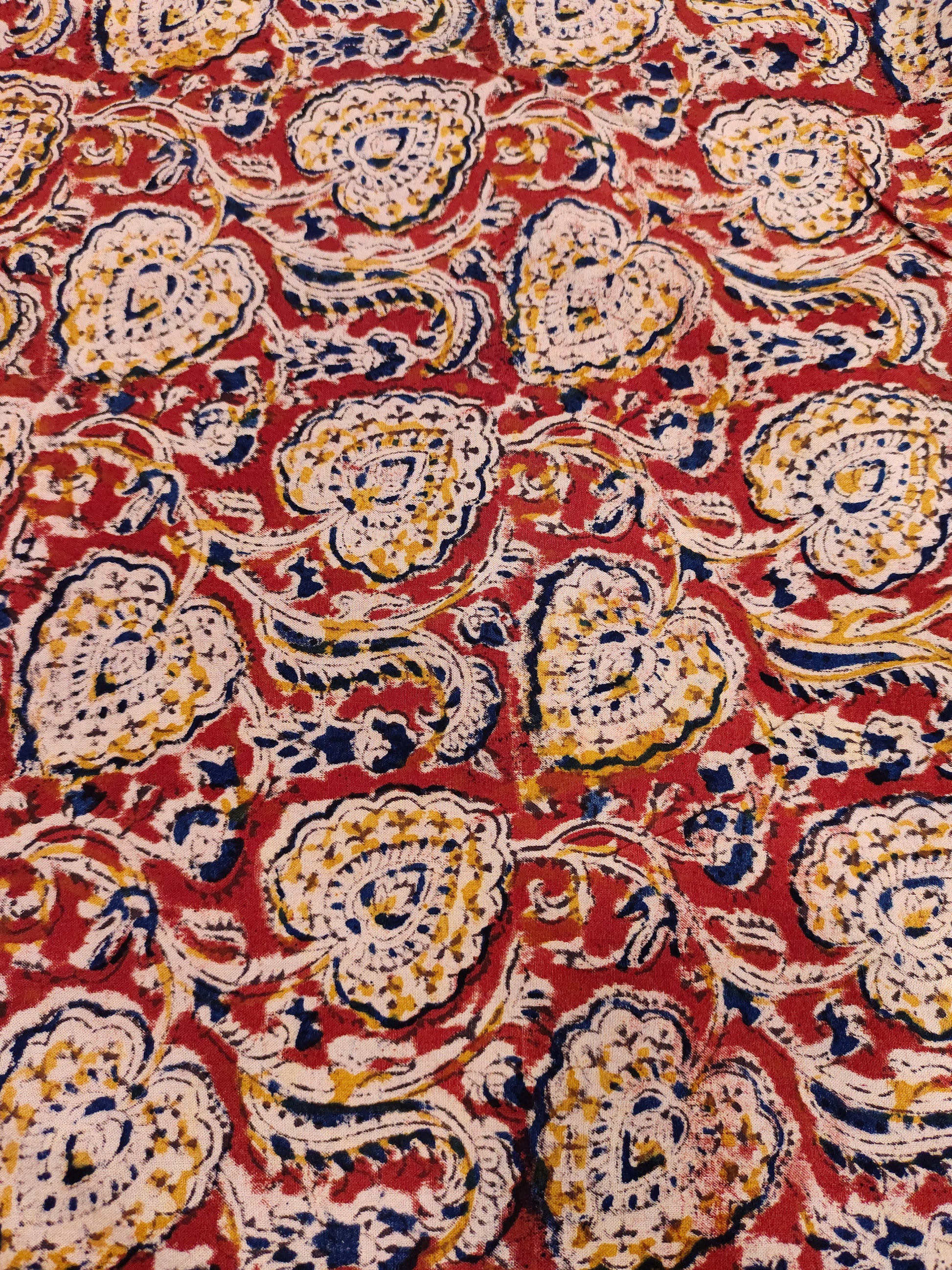 maroon kalamkari with blue and mustard color