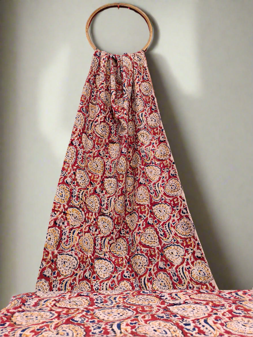 maroon kalamkari with blue and mustard color