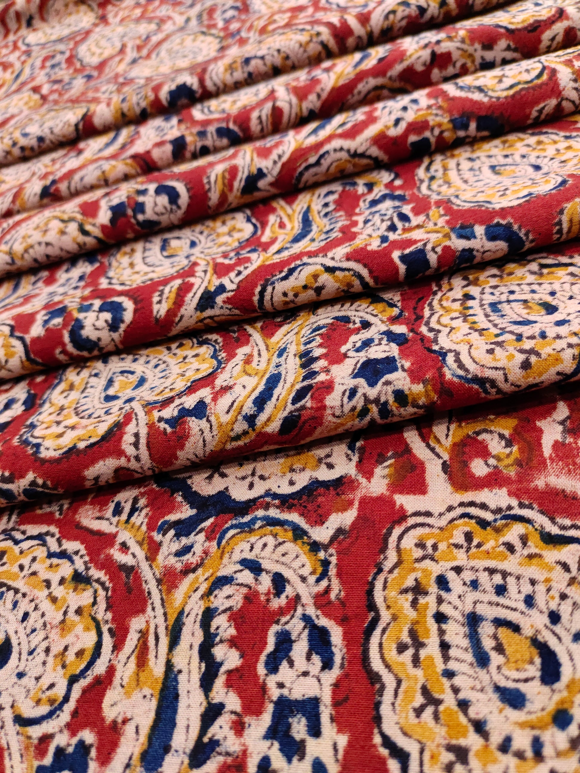 maroon kalamkari with blue and mustard color