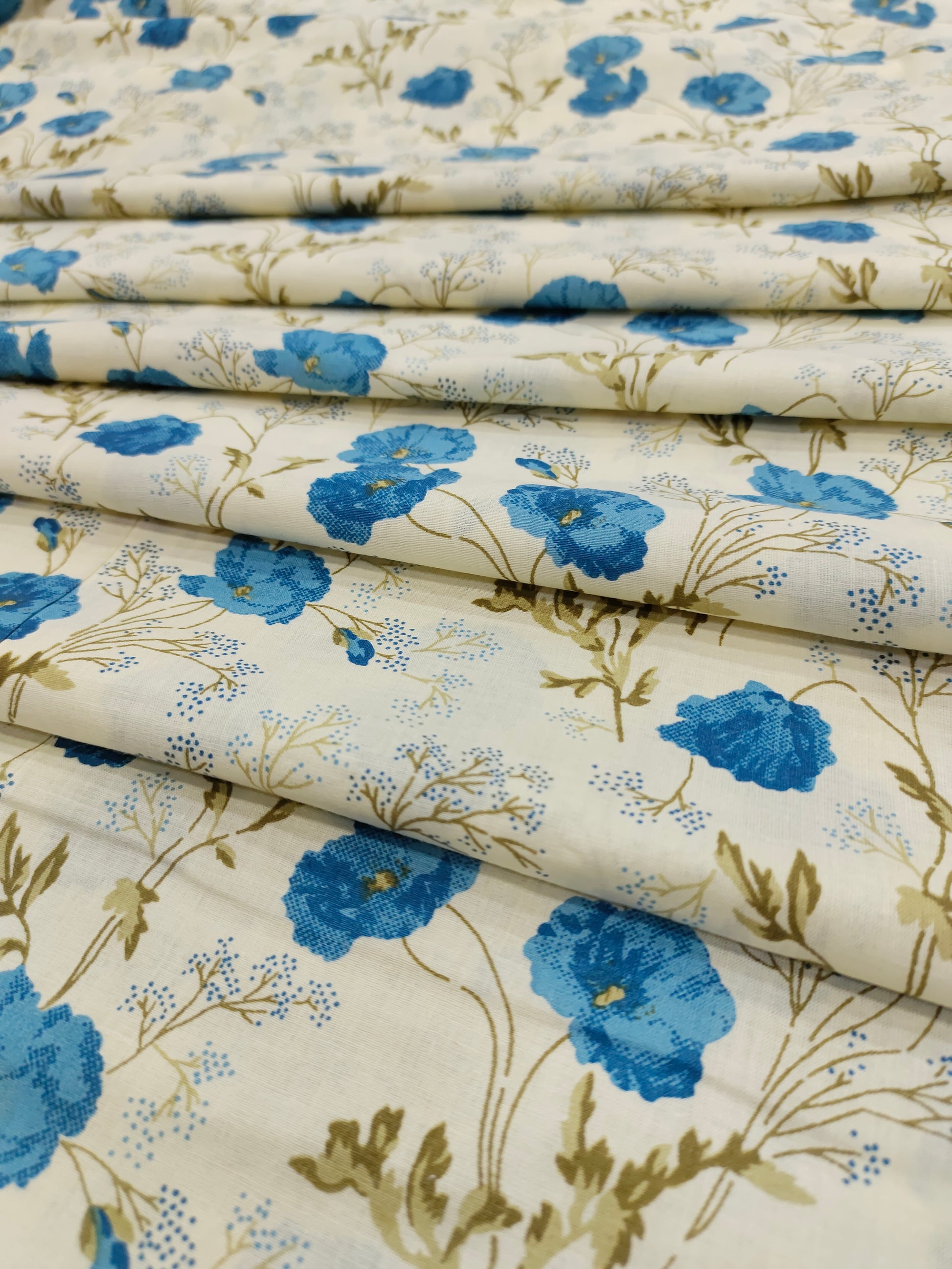 cream base with blue floral cotton screen print fabric