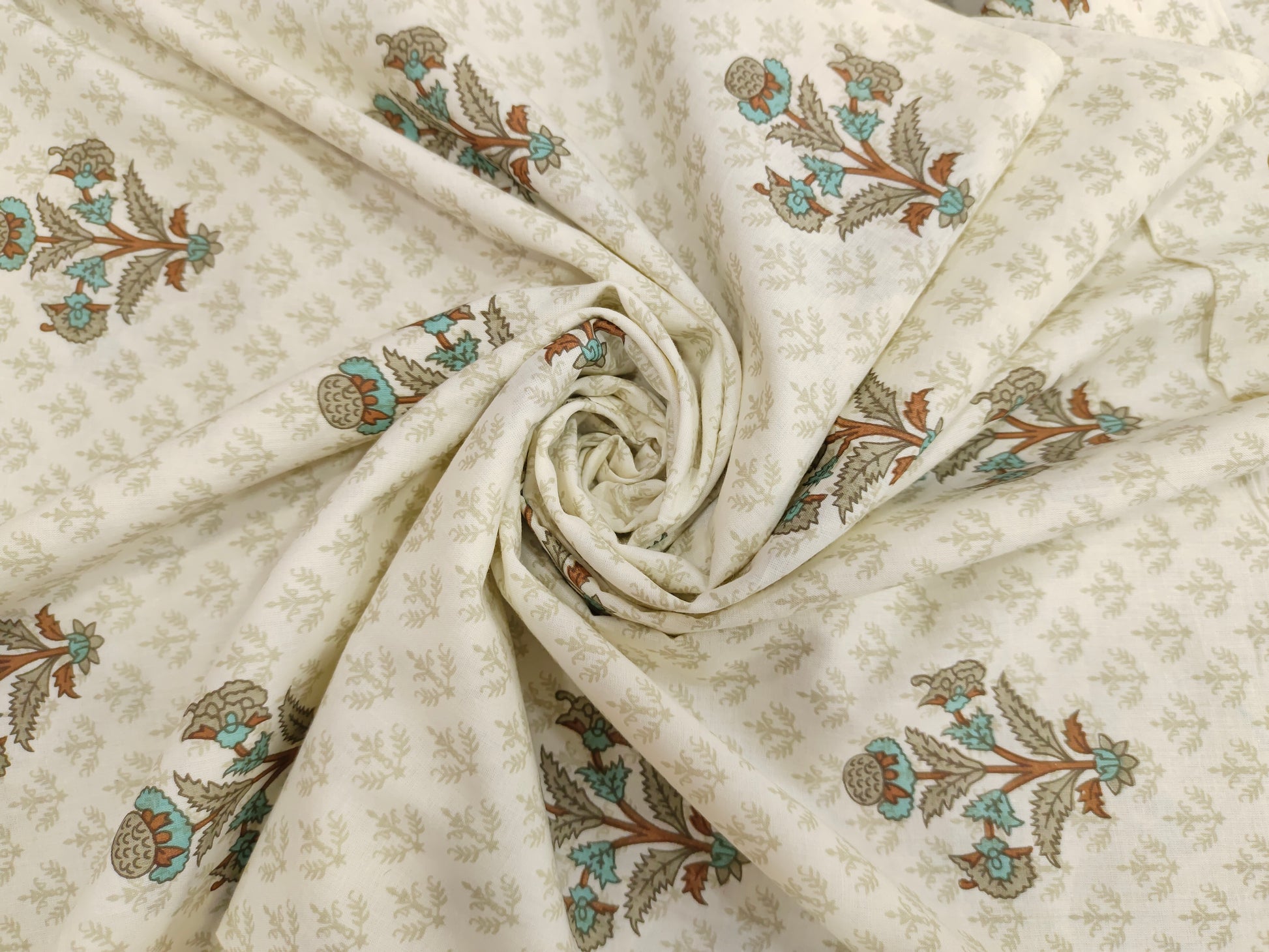 White base with brown, grey & blue print