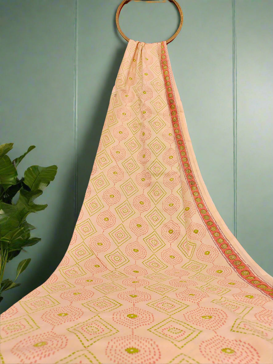 Light Peach hand block fabric print with green & pink with a subtle border