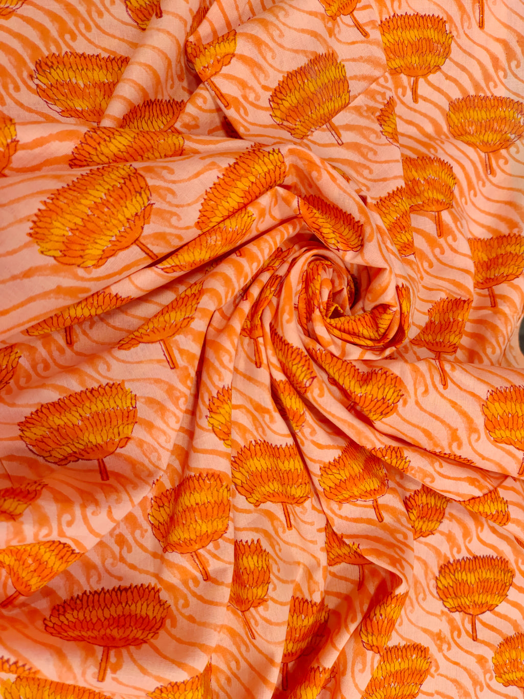 orange handblock print with orange flowers