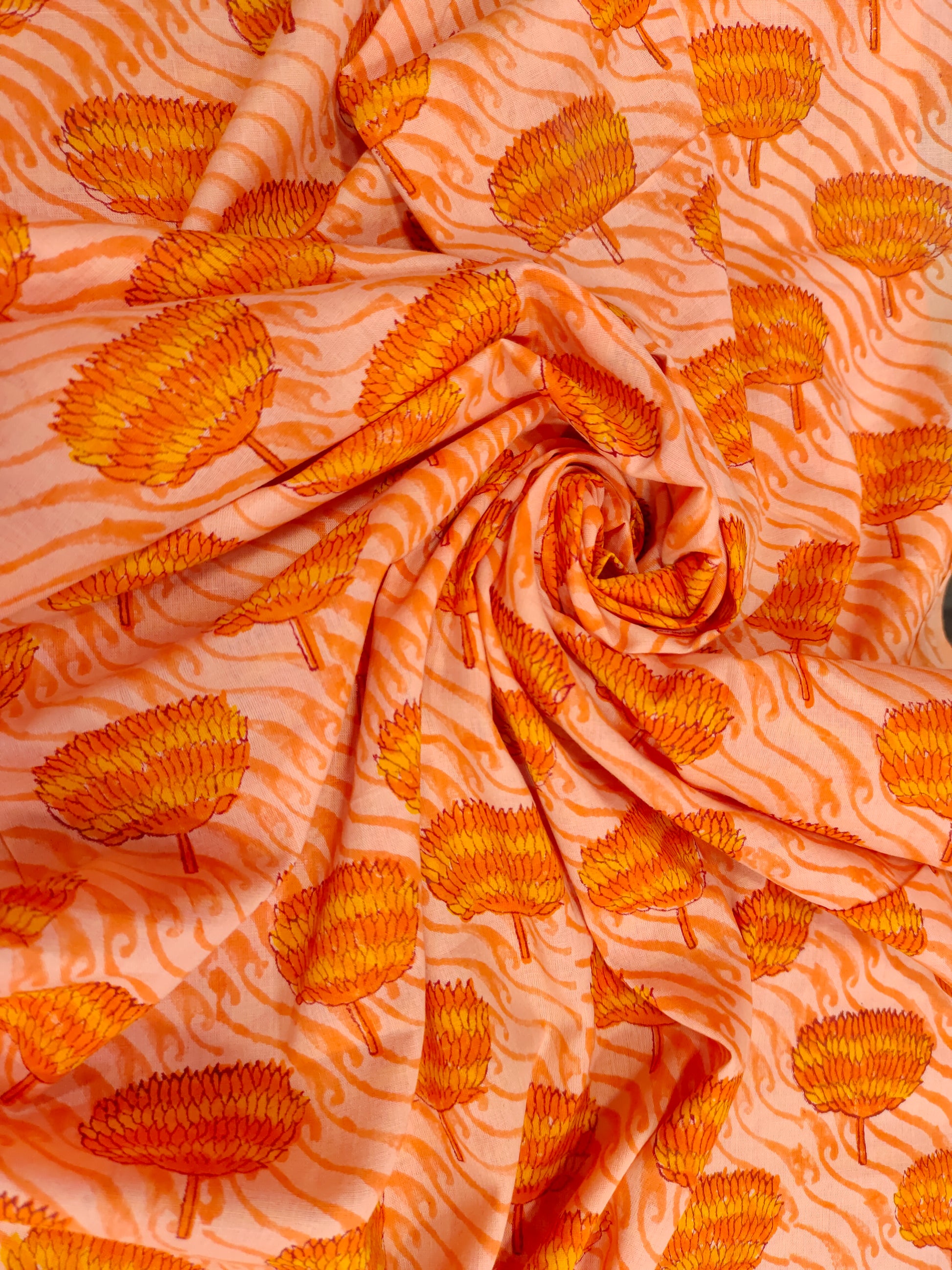 orange handblock print with orange flowers