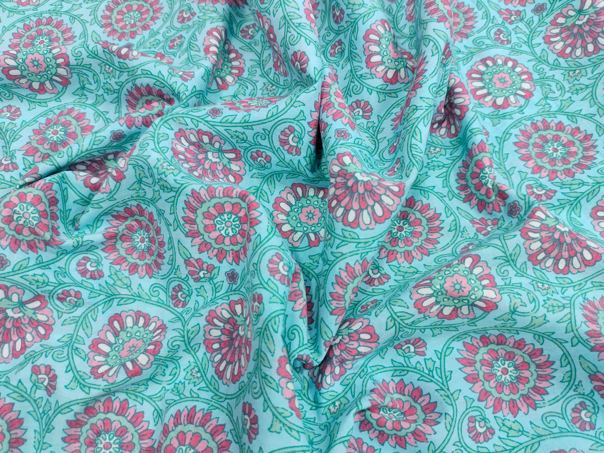 Pink cool floral print on blue fabric