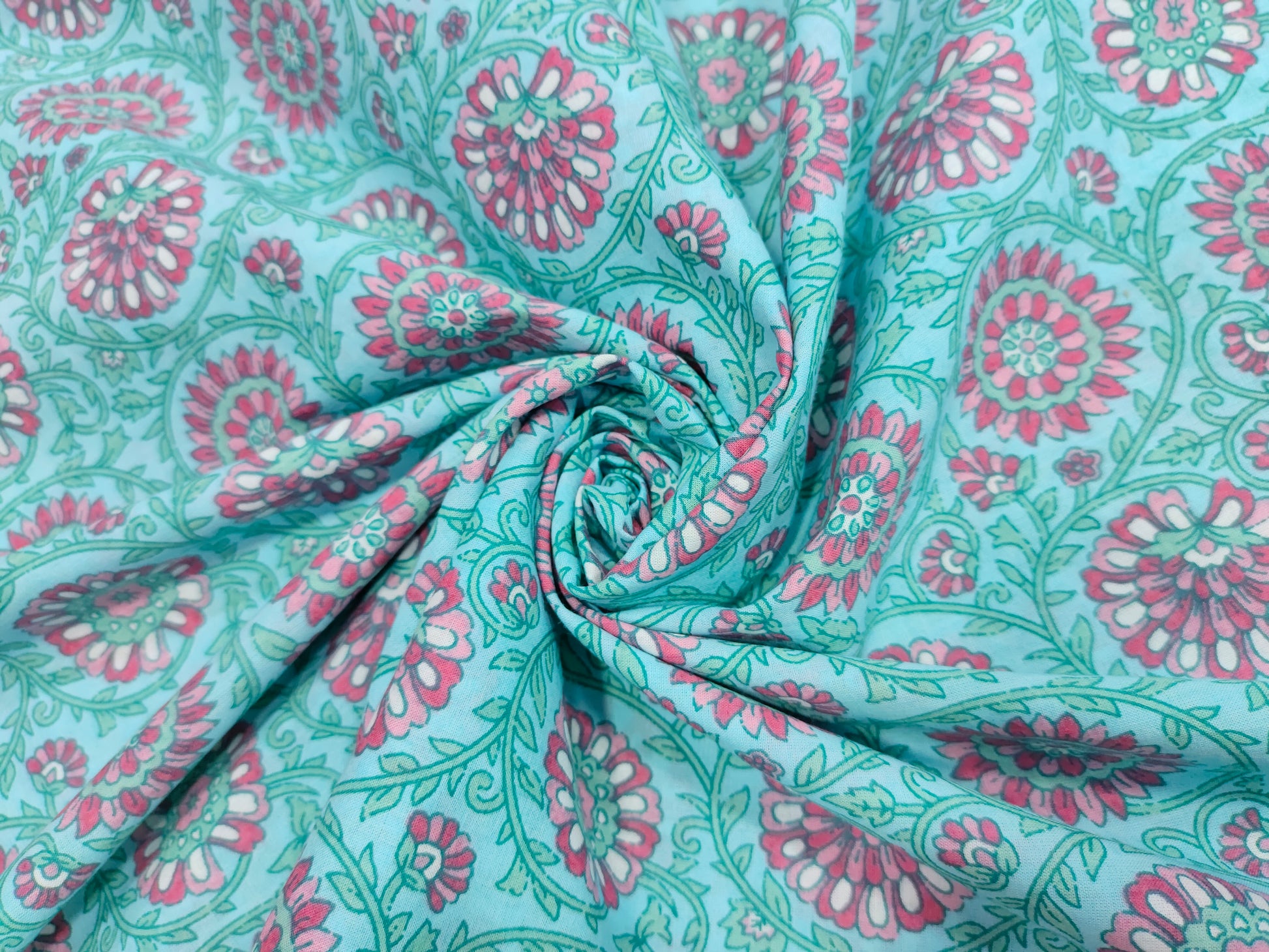 Pink cool floral print on blue fabric