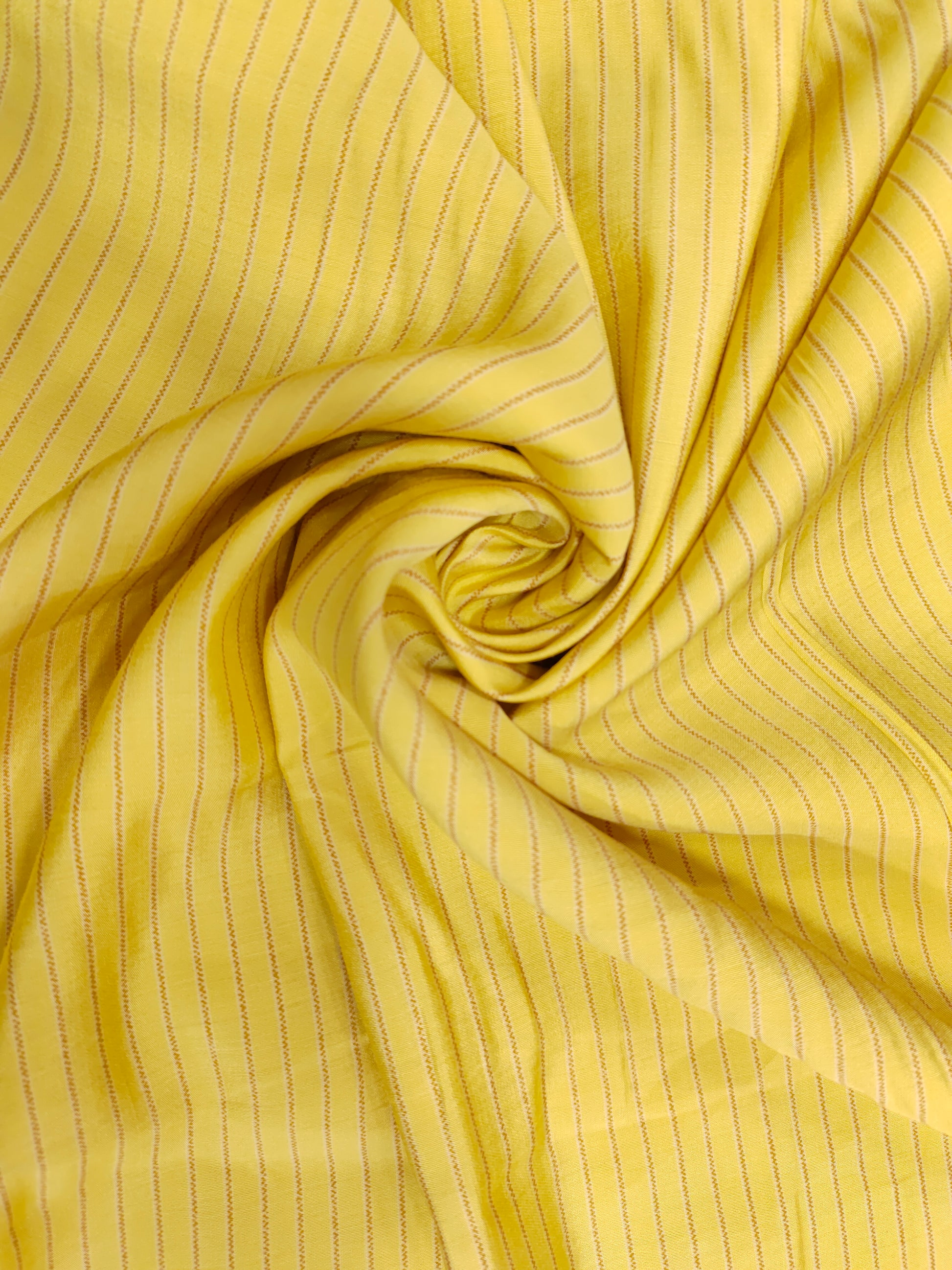 Light lemon muslin fabric with grey stripes