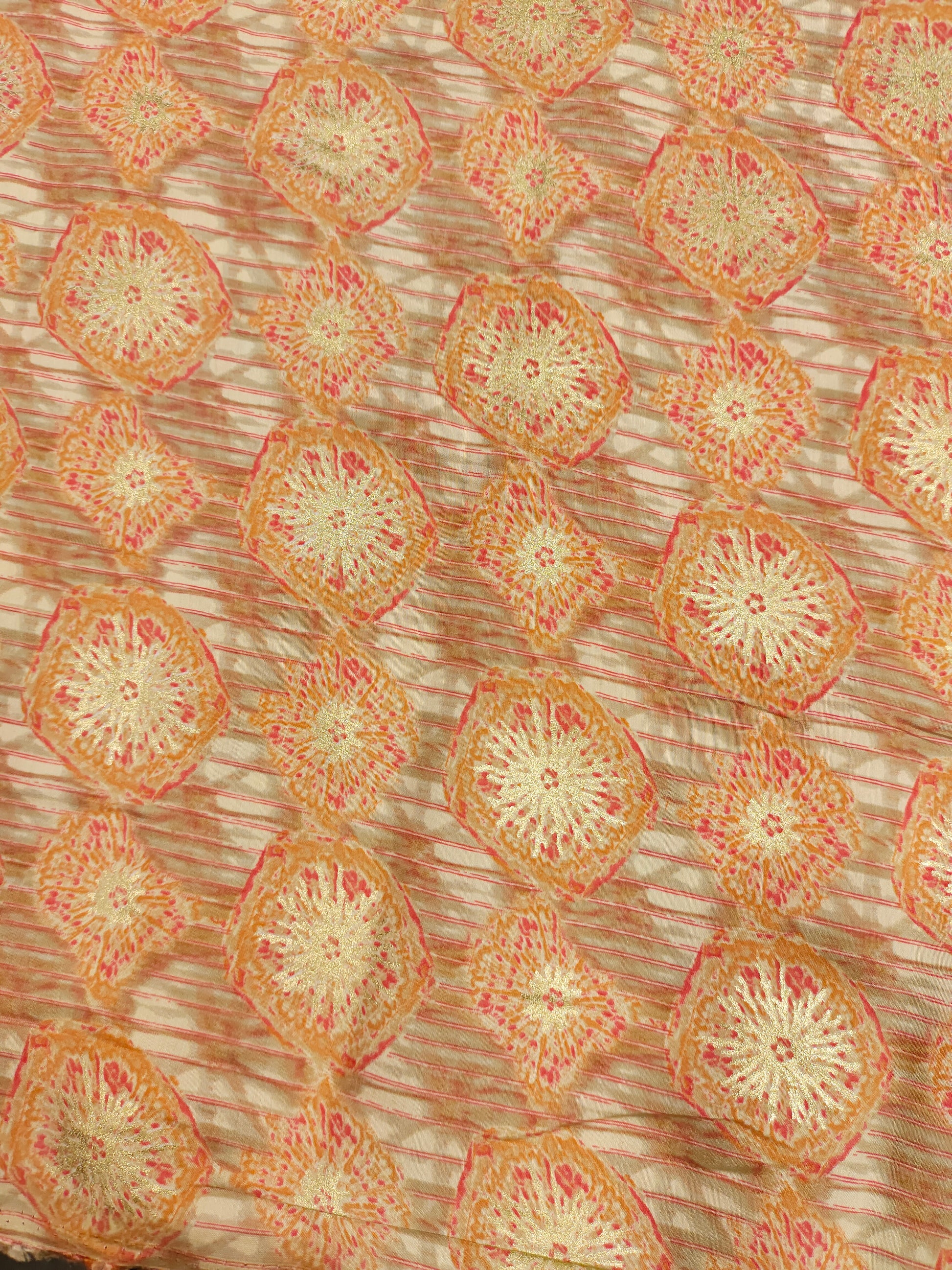 Muslin fabric with beige base with red and gold digital print