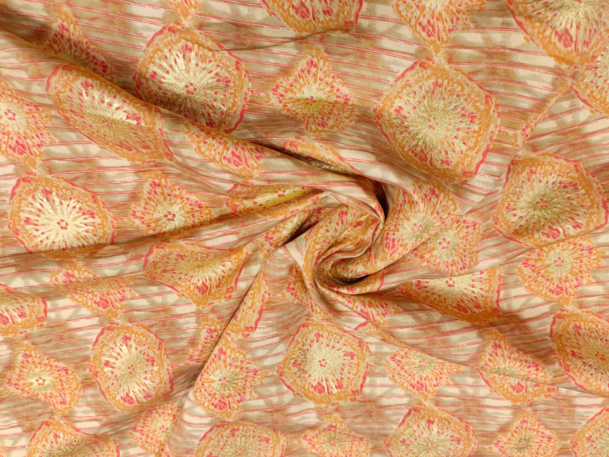 Muslin fabric with beige base with red and gold digital print