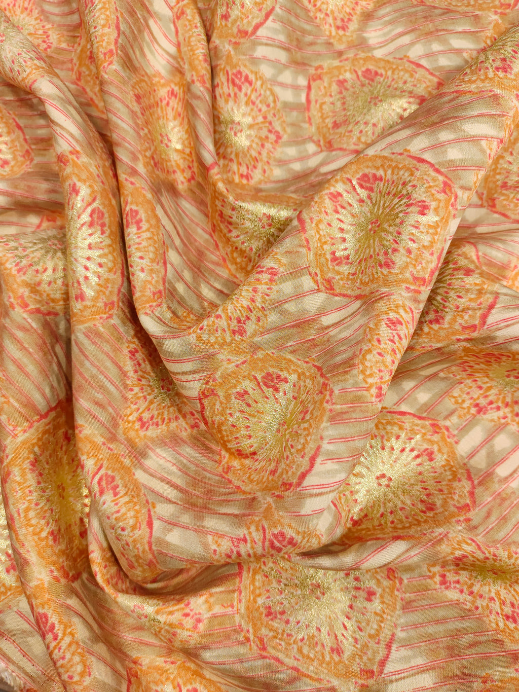 Muslin fabric with beige base with red and gold digital print
