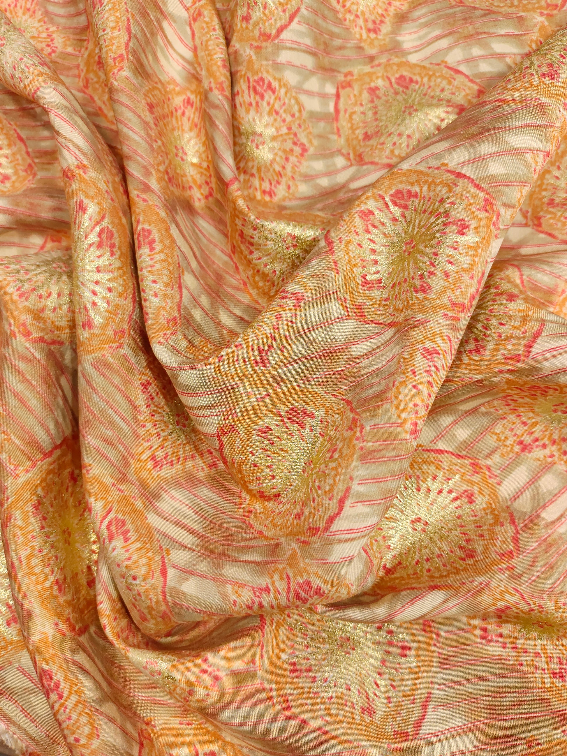 Muslin fabric with beige base with red and gold digital print