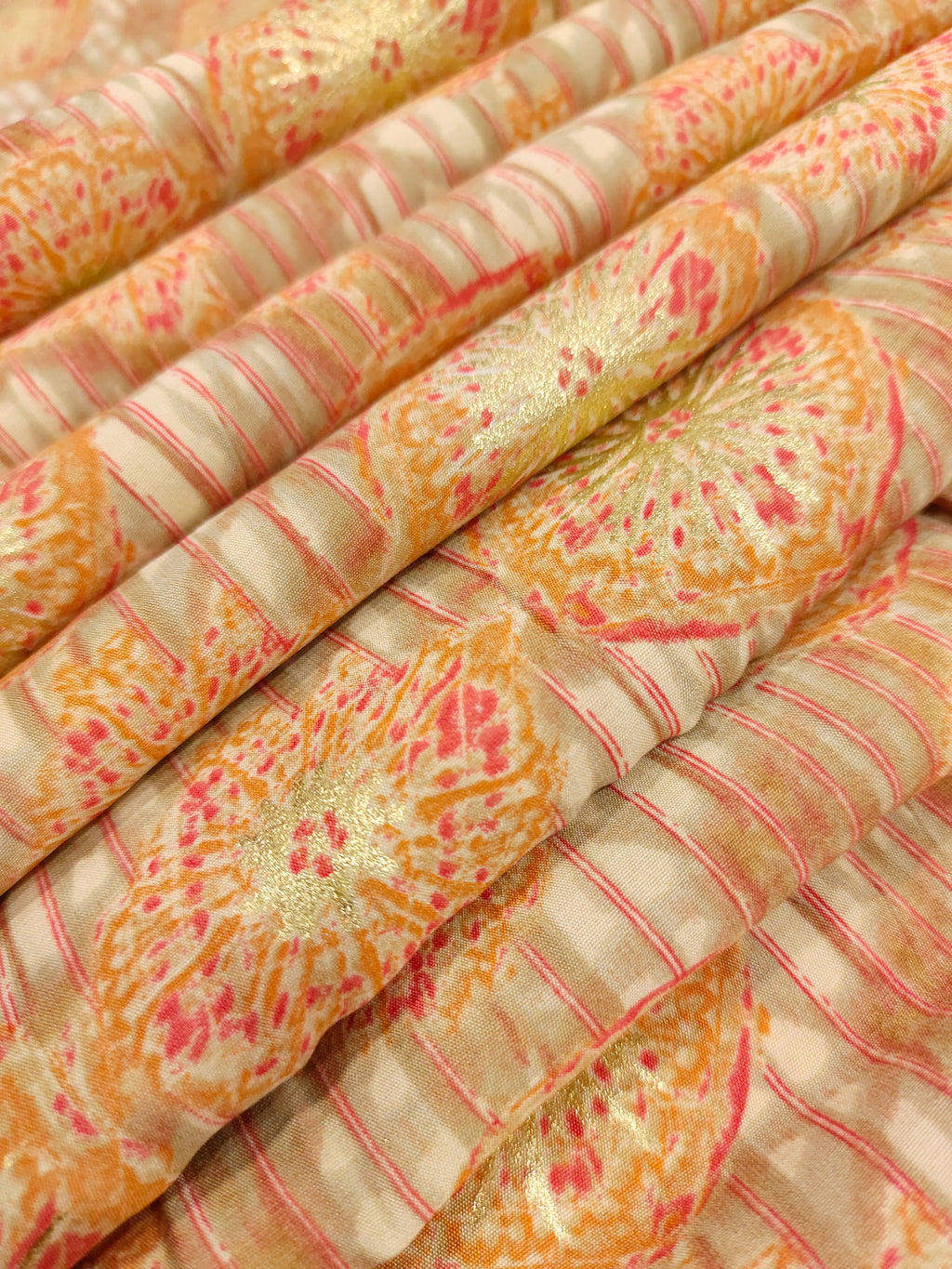 Muslin fabric with beige base with red and gold digital print